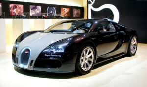 A silver and black Bugatti Veyron Fbg par Hermes edition on display at the 2009 Barcelona motor show, front three-quarter view