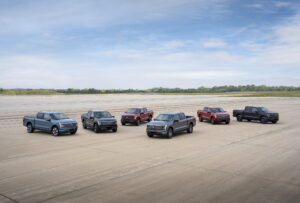 2024 Ford F-150 Lightning electric pickup truck press photo, front three-quarter view