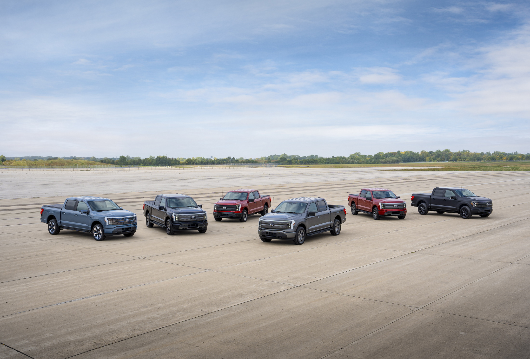 2024 Ford F-150 Lightning electric pickup truck press photo, front three-quarter view