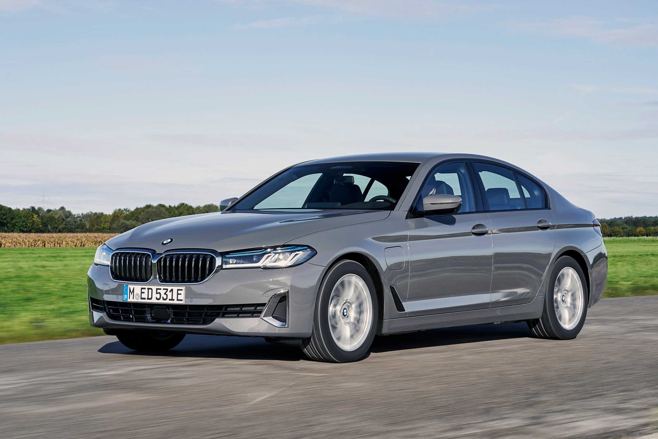 BMW 5 Series G30 LCI side profile in Bernina Grey showing redesigned aerodynamic details and 18-inch wheels