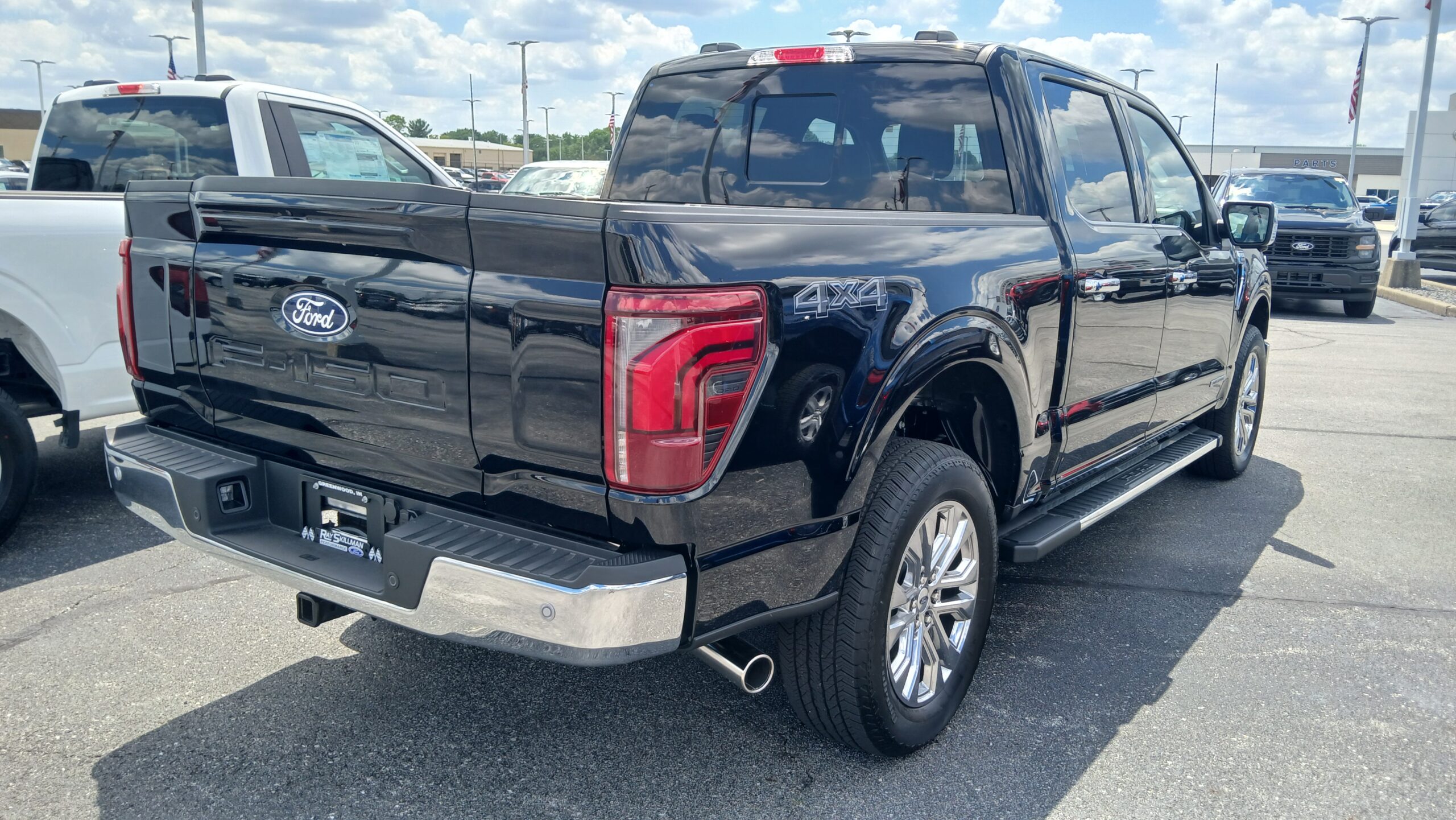 2024 Ford F-150 Lariat rear view showing tailgate and bed