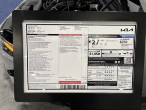 Dealership window sticker on a 2023 Kia K5 GT showing the Monroney label