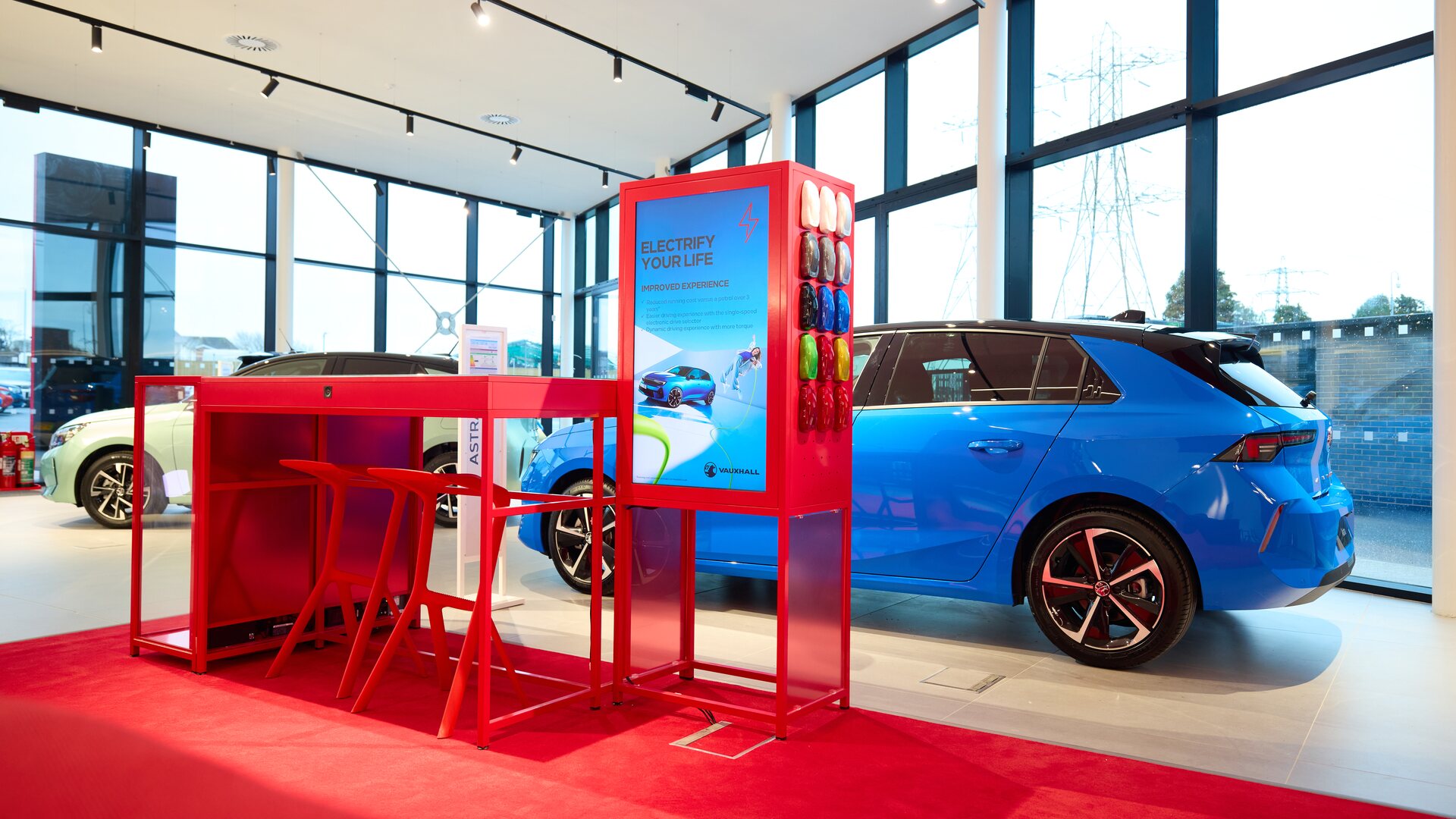 UK car retailer showroom interior showing financing area for motor finance redress claims