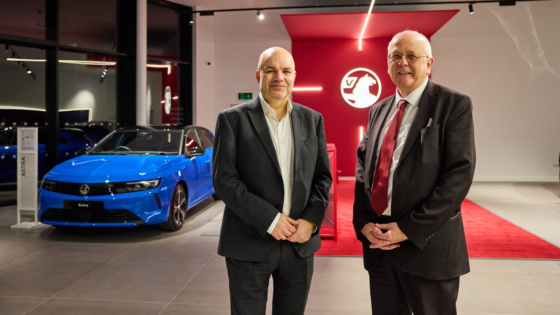 UK Vauxhall retailer staff at handover, illustrating PCP and HP motor finance redress process