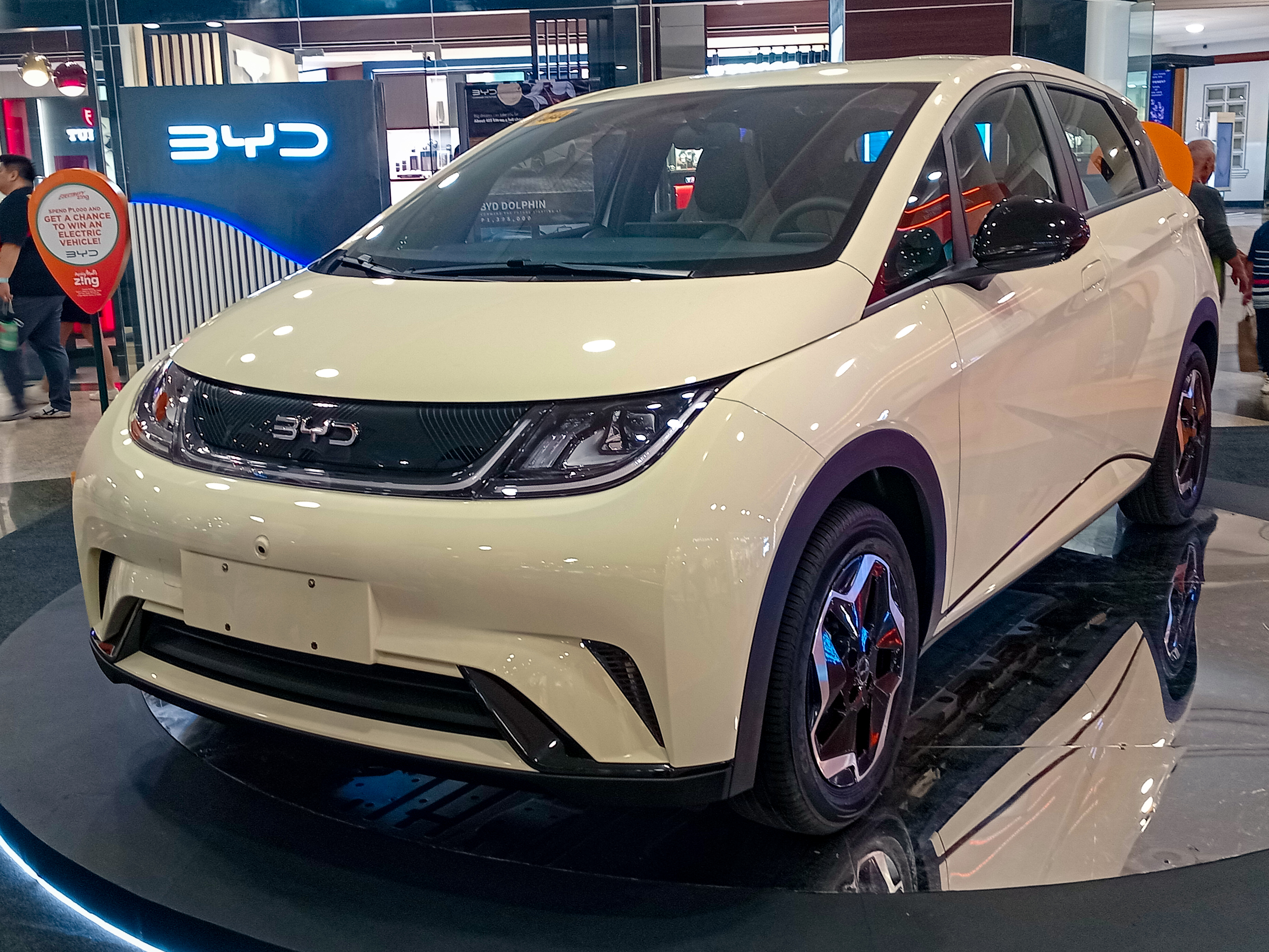 BYD Dolphin compact electric hatchback in cream white, BYD-led UK EV market 2026