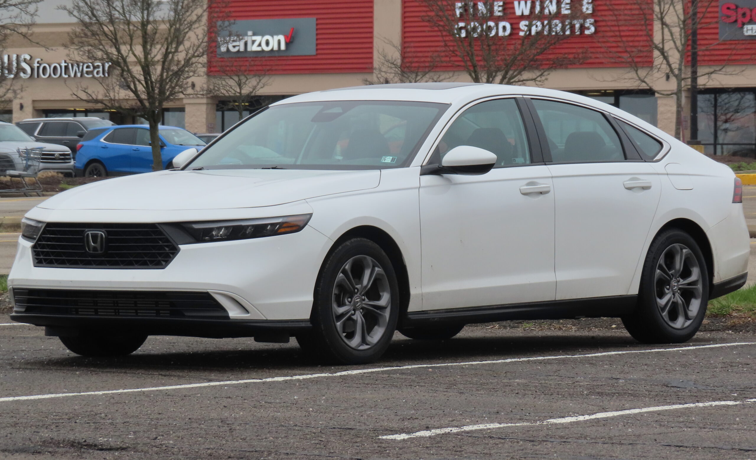 2024 Honda Accord EX sedan in silver photographed from the front left