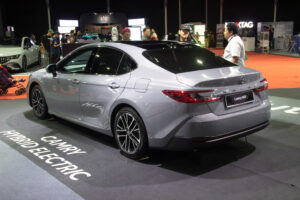 2025 Toyota Camry XV80 2.5 HEV photographed from the rear three-quarter