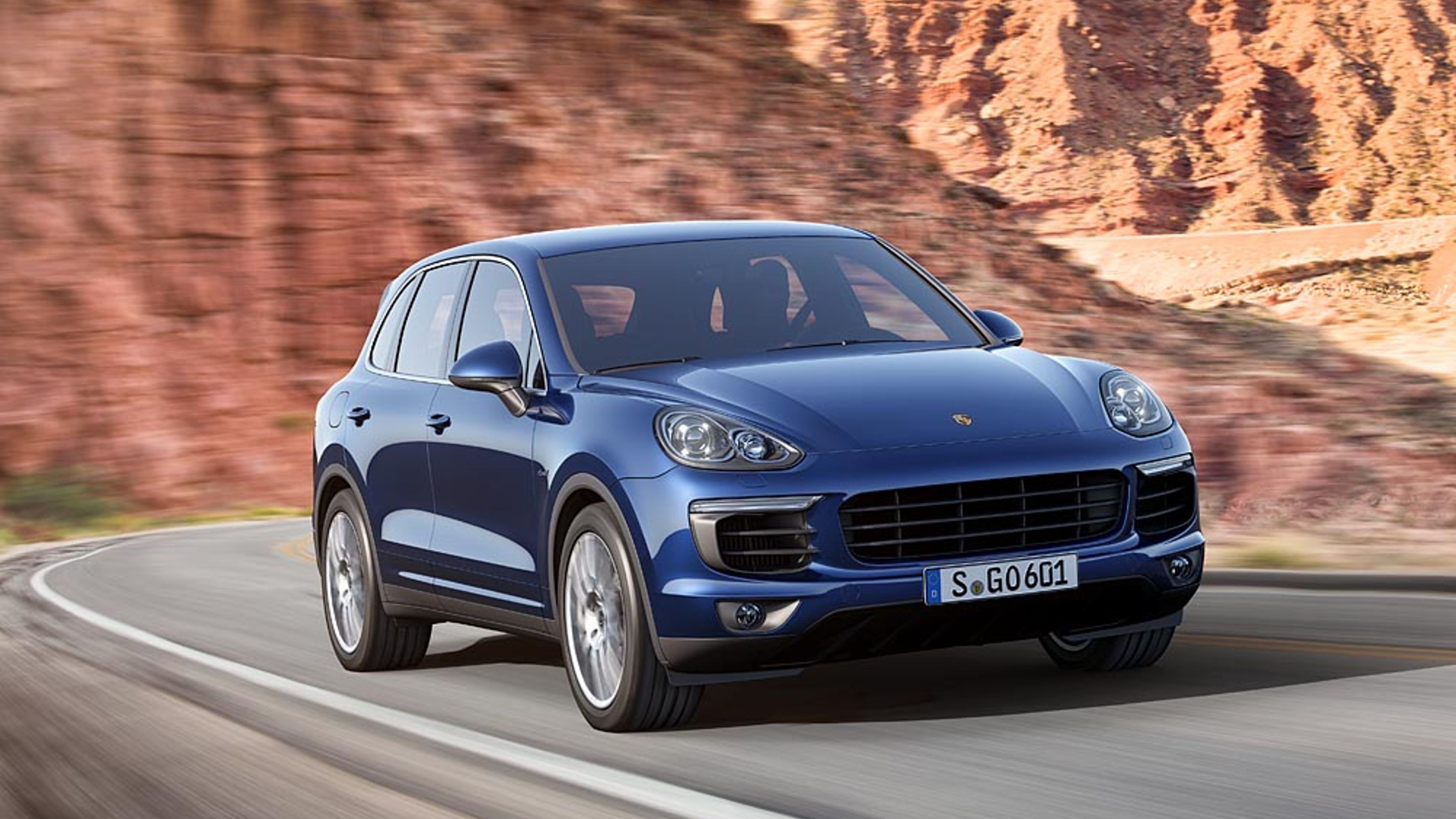 Porsche Cayenne 958 facelift front three-quarter view in motion
