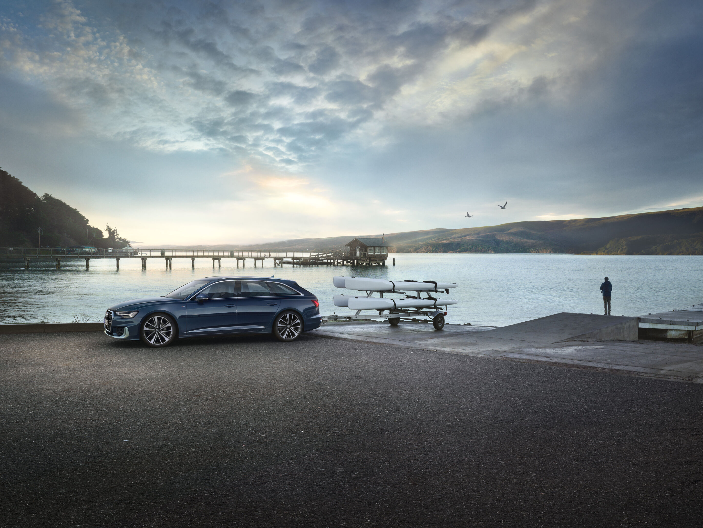 Audi A6 Avant C8 in Firmament Blue, static three-quarter view