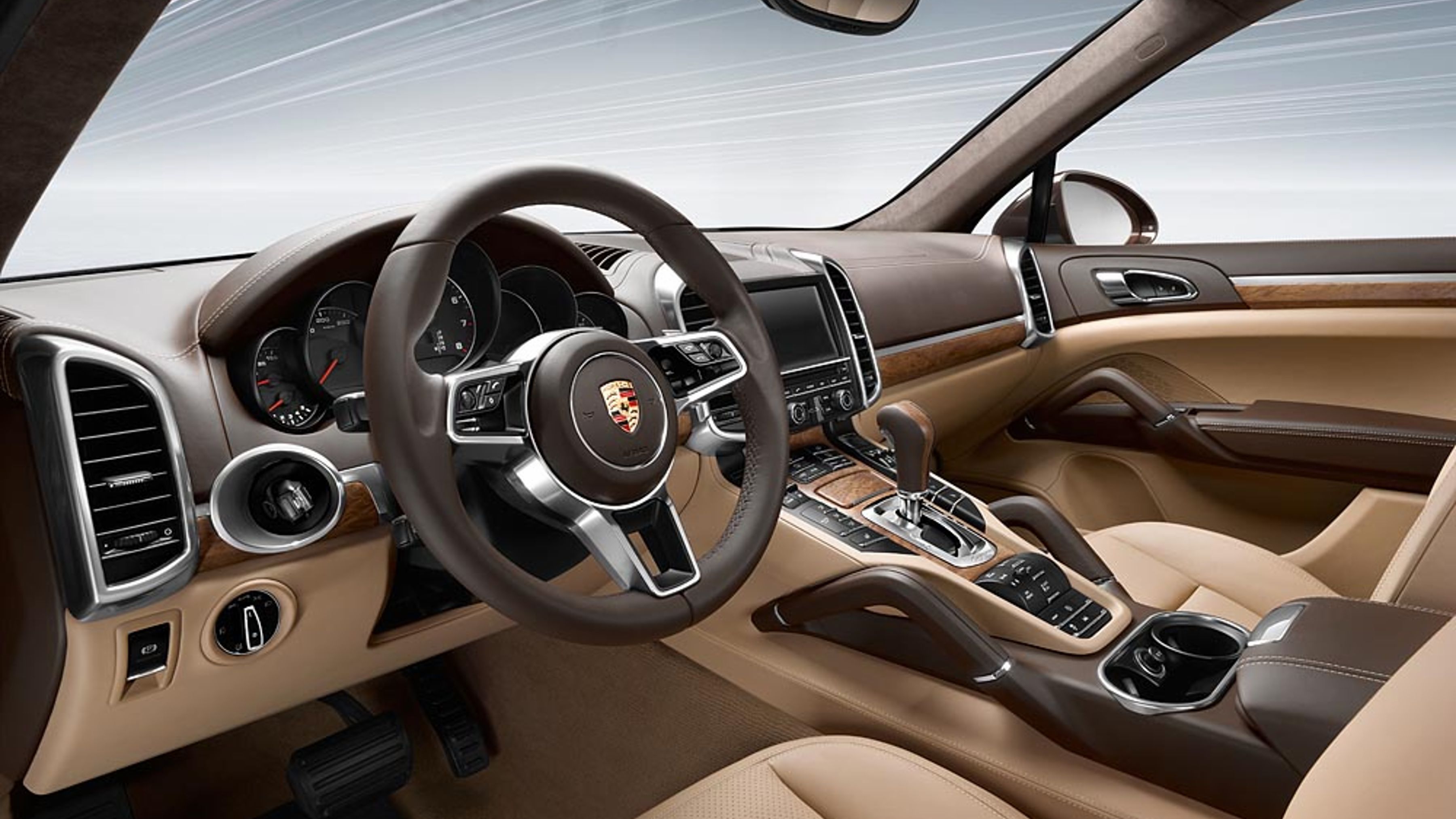 Interior cockpit of a 958-generation Porsche Cayenne with two-tone leather