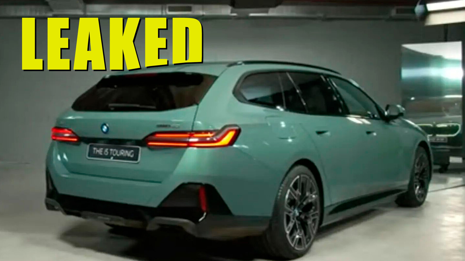 BMW i5 Touring rear three quarter UK