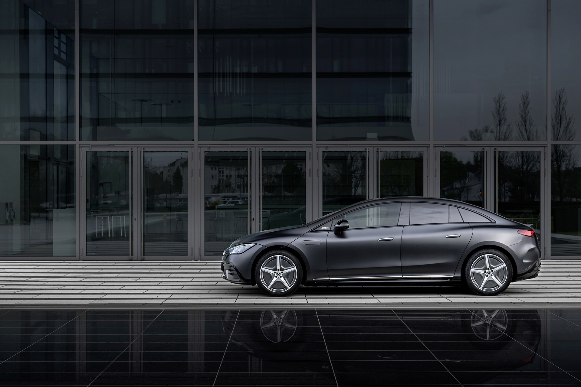 Mercedes-EQ EQE saloon side profile, a premium EV a director can run via salary sacrifice or company purchase