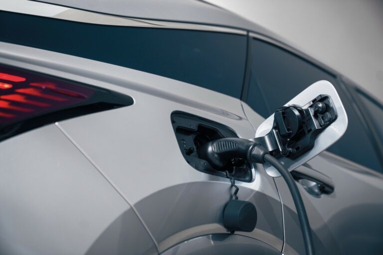 Lexus RX premium plug-in hybrid charging, illustrating no-claims discount protection on a high-value car policy