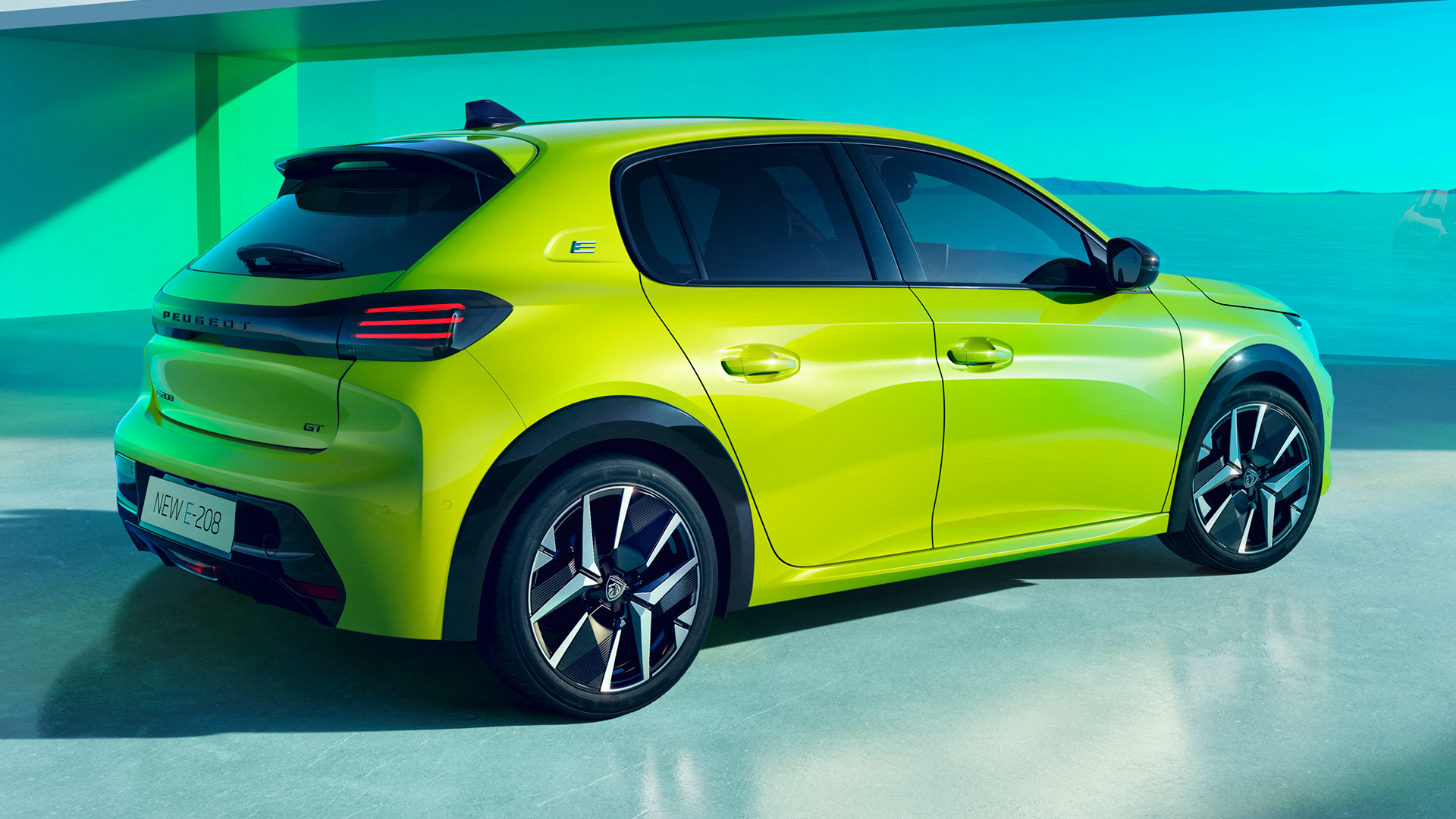 Peugeot e-208 facelift rear three-quarter in Acid Green, salary sacrifice maths