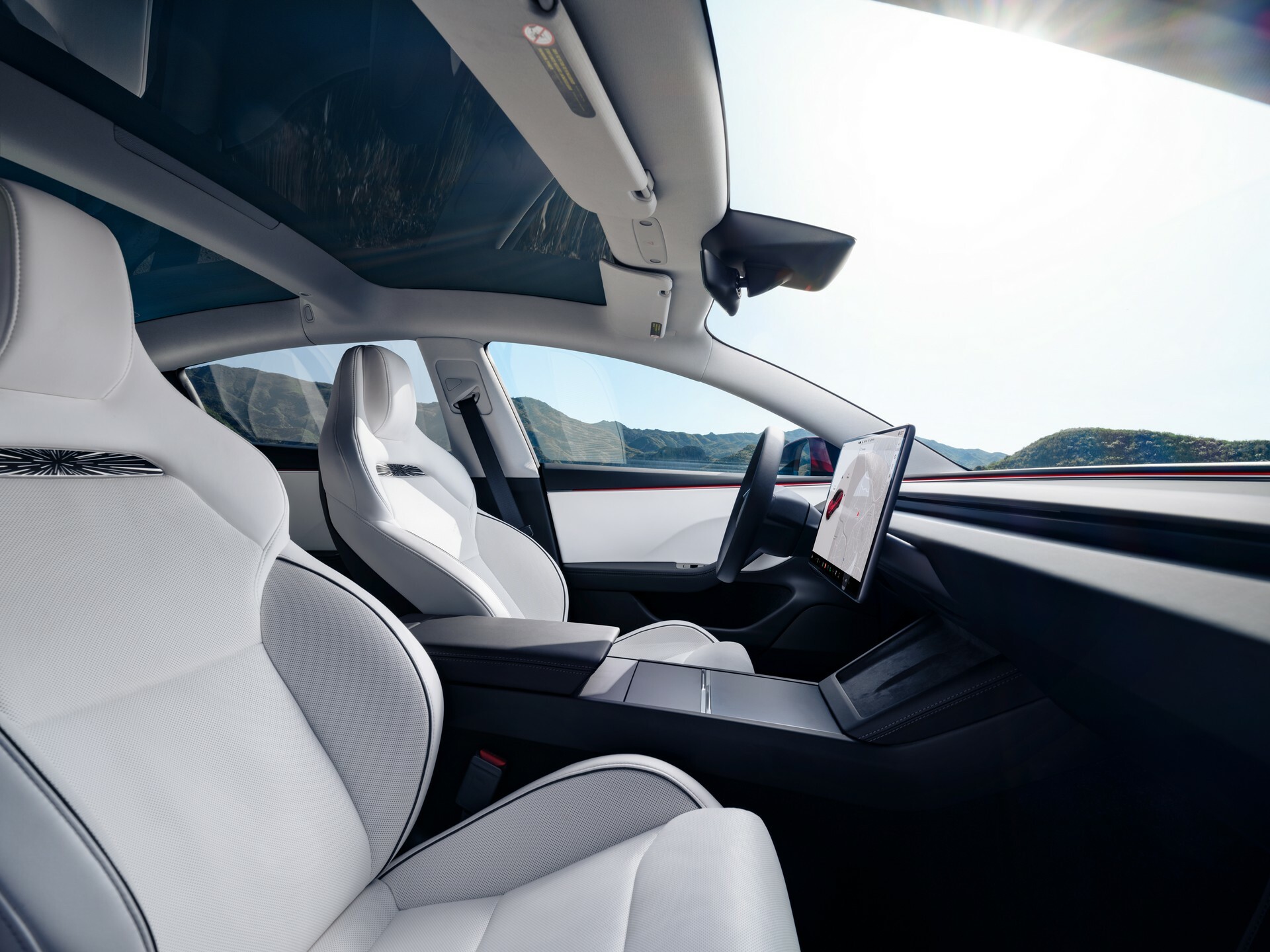 Tesla Model 3 used interior showing the white seats and central touchscreen