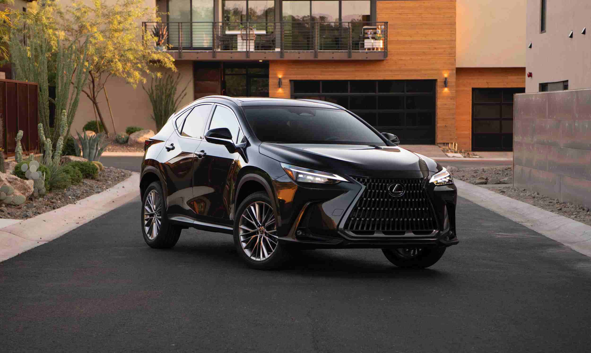 Lexus NX residual values explained, black hybrid SUV front three-quarter