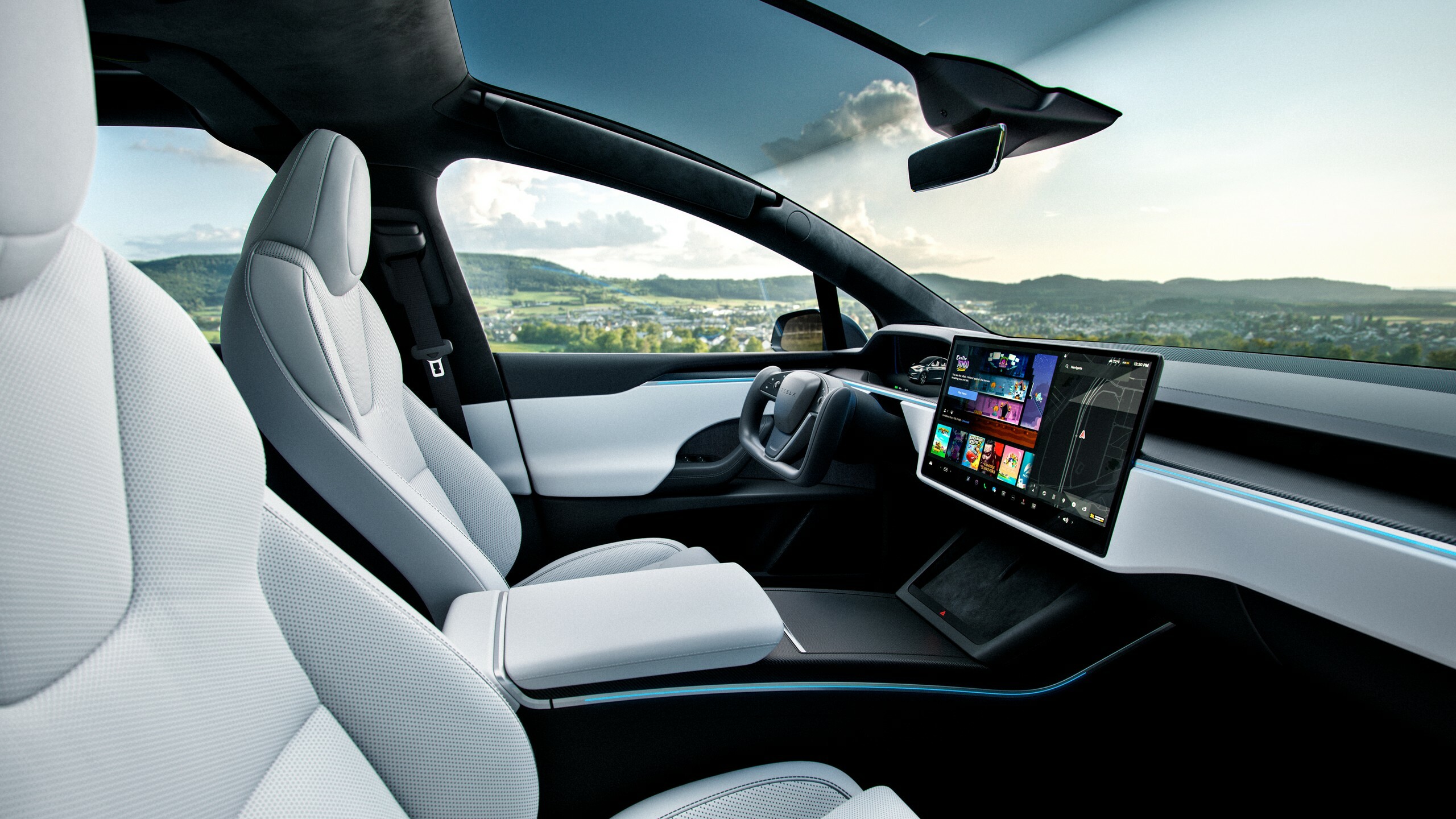 Tesla Model X interior with yoke and touchscreen, used value data