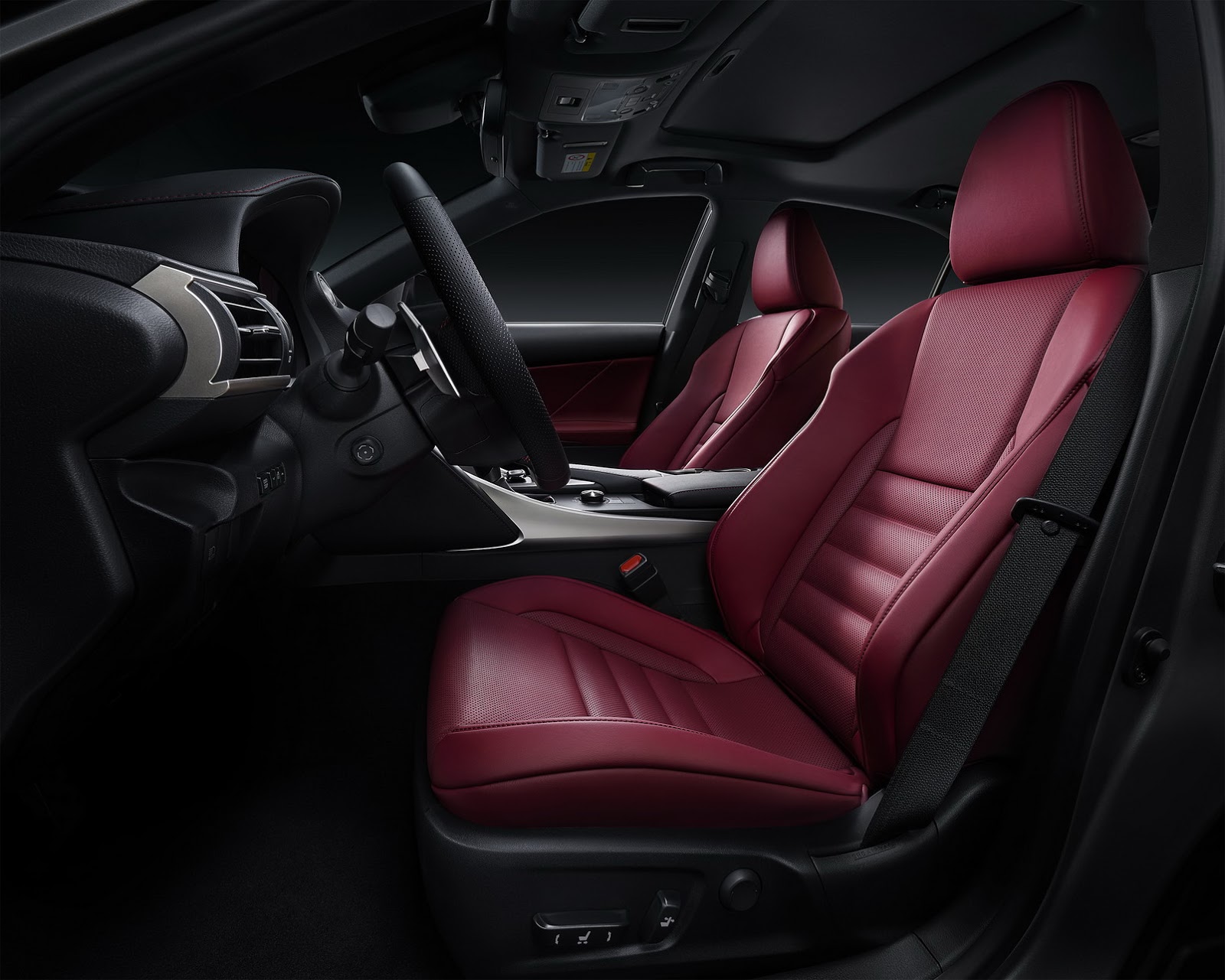 Lexus IS 300h F Sport interior with red leather seats and driver controls