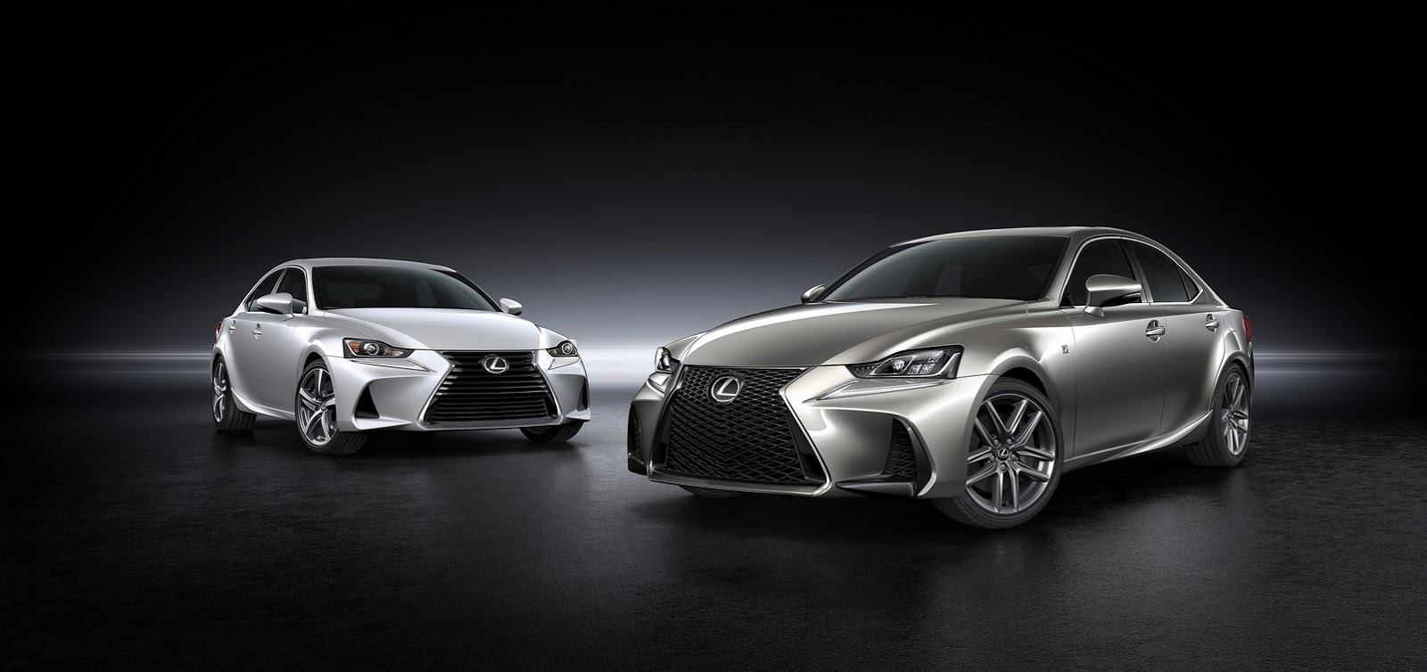 Two Lexus IS 300h saloons, standard and F Sport, showing the XE30 design