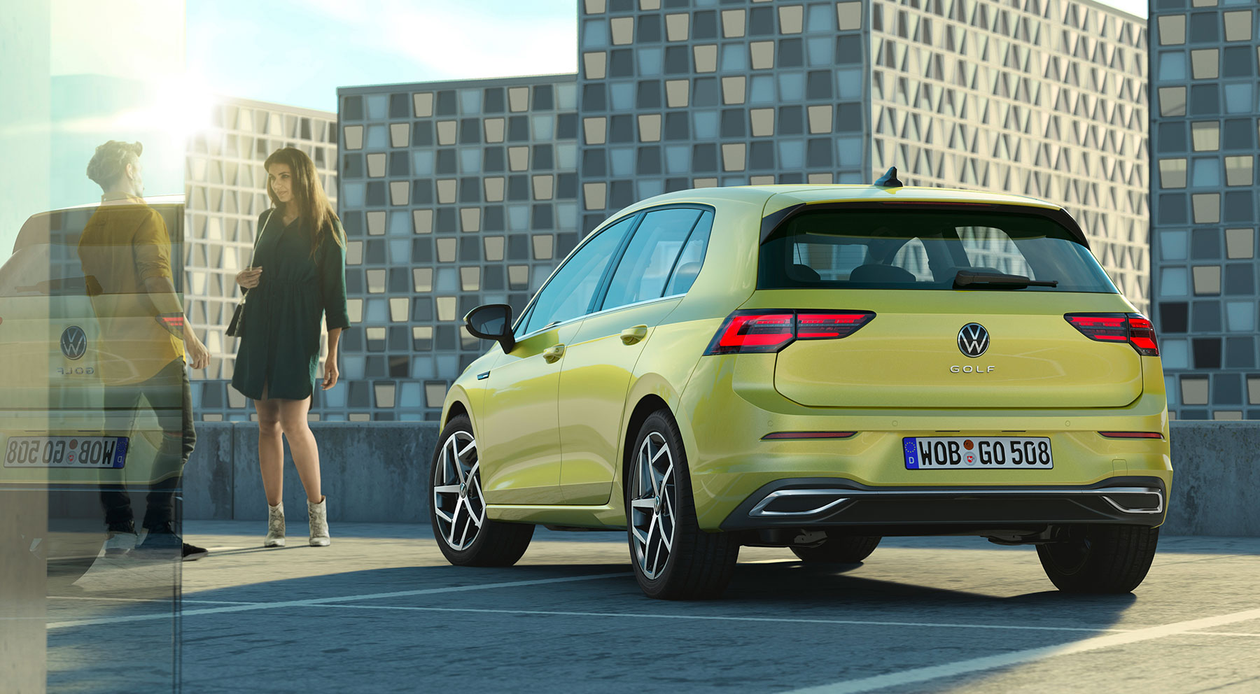 VW Golf Mk8 approved used rear three-quarter view in a city setting