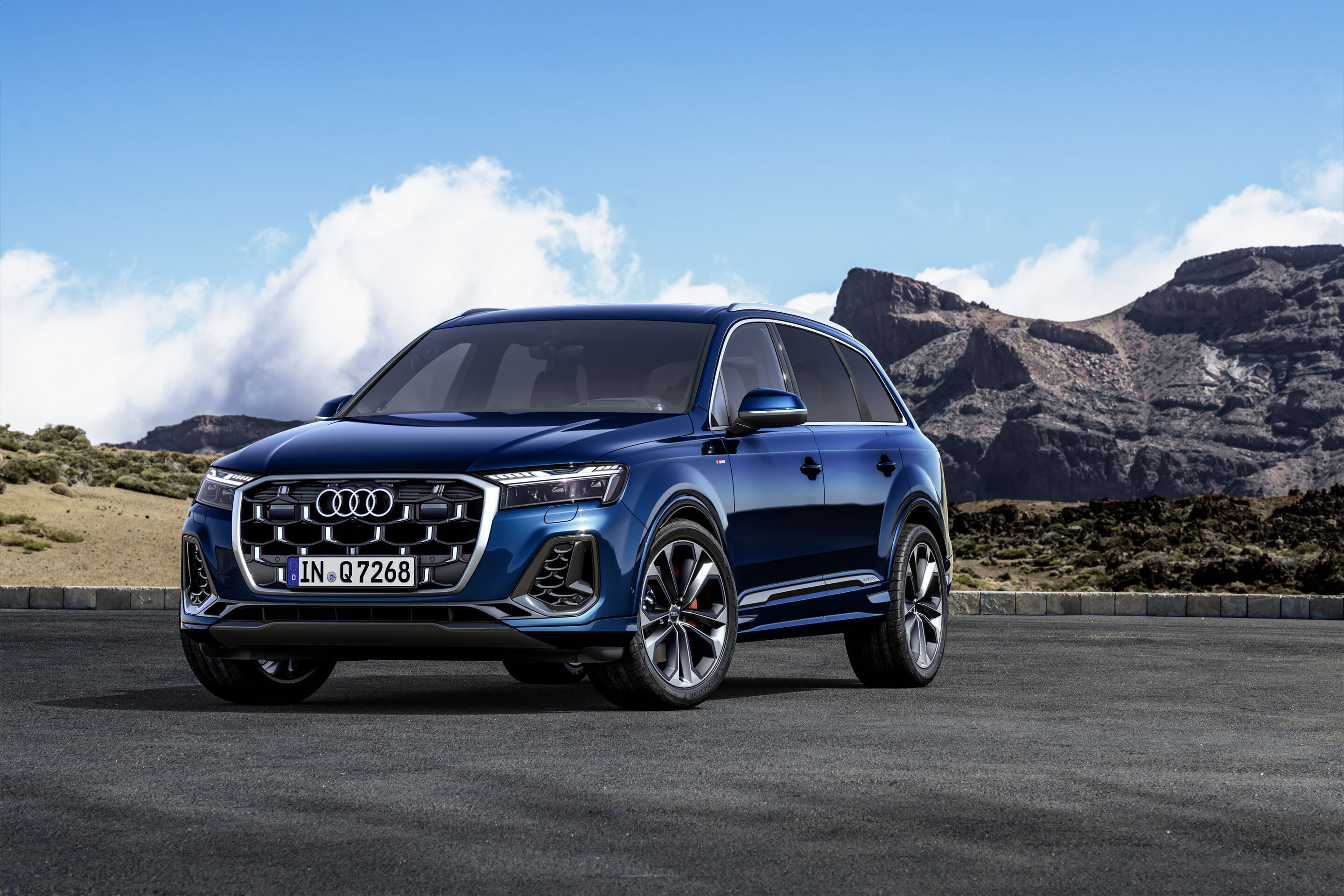 Used premium diesel Audi Q7 photographed against mountains, a Clean Air Zone value buy