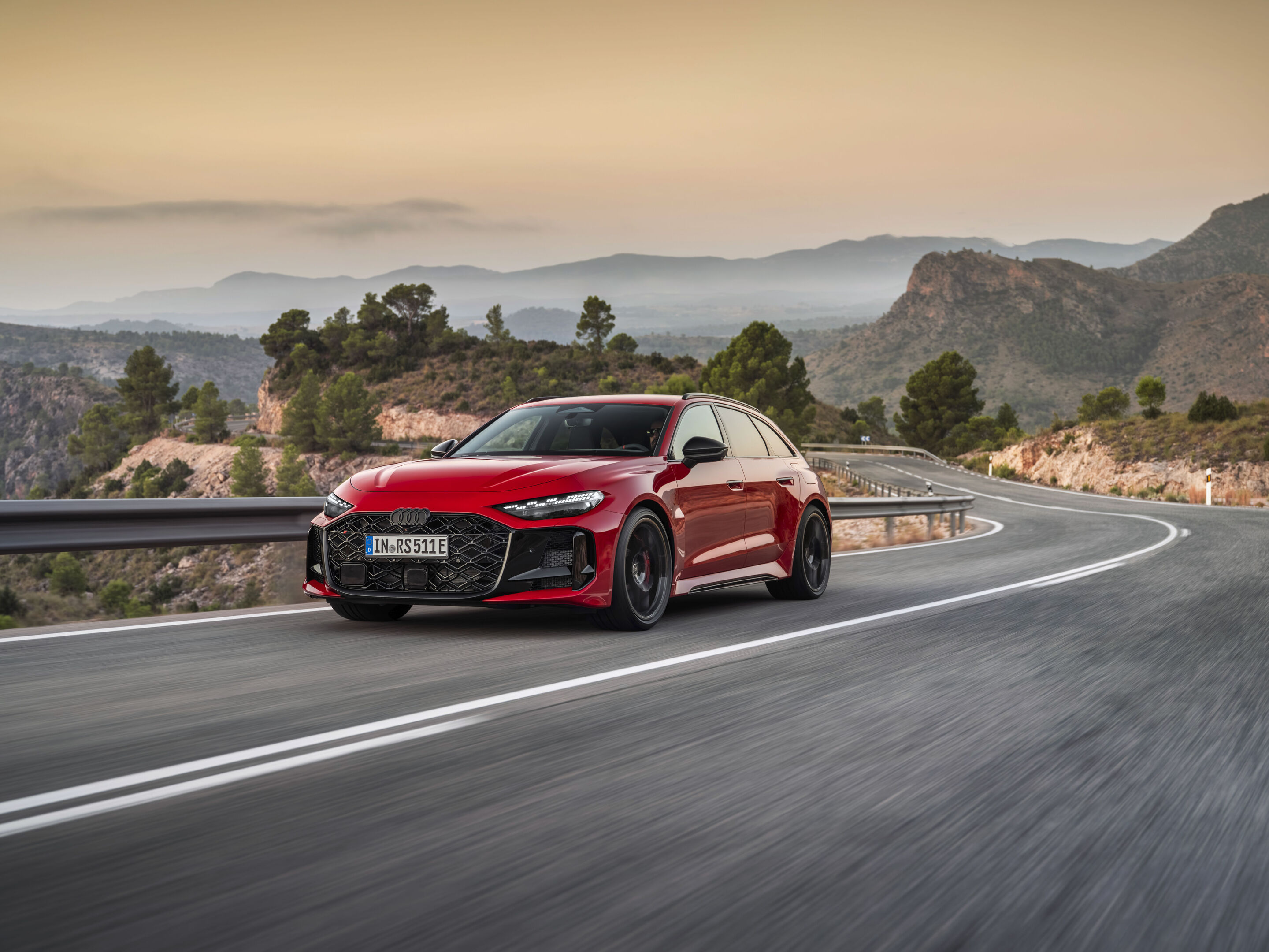 New Audi RS5 e-hybrid saloon front three-quarter static shot