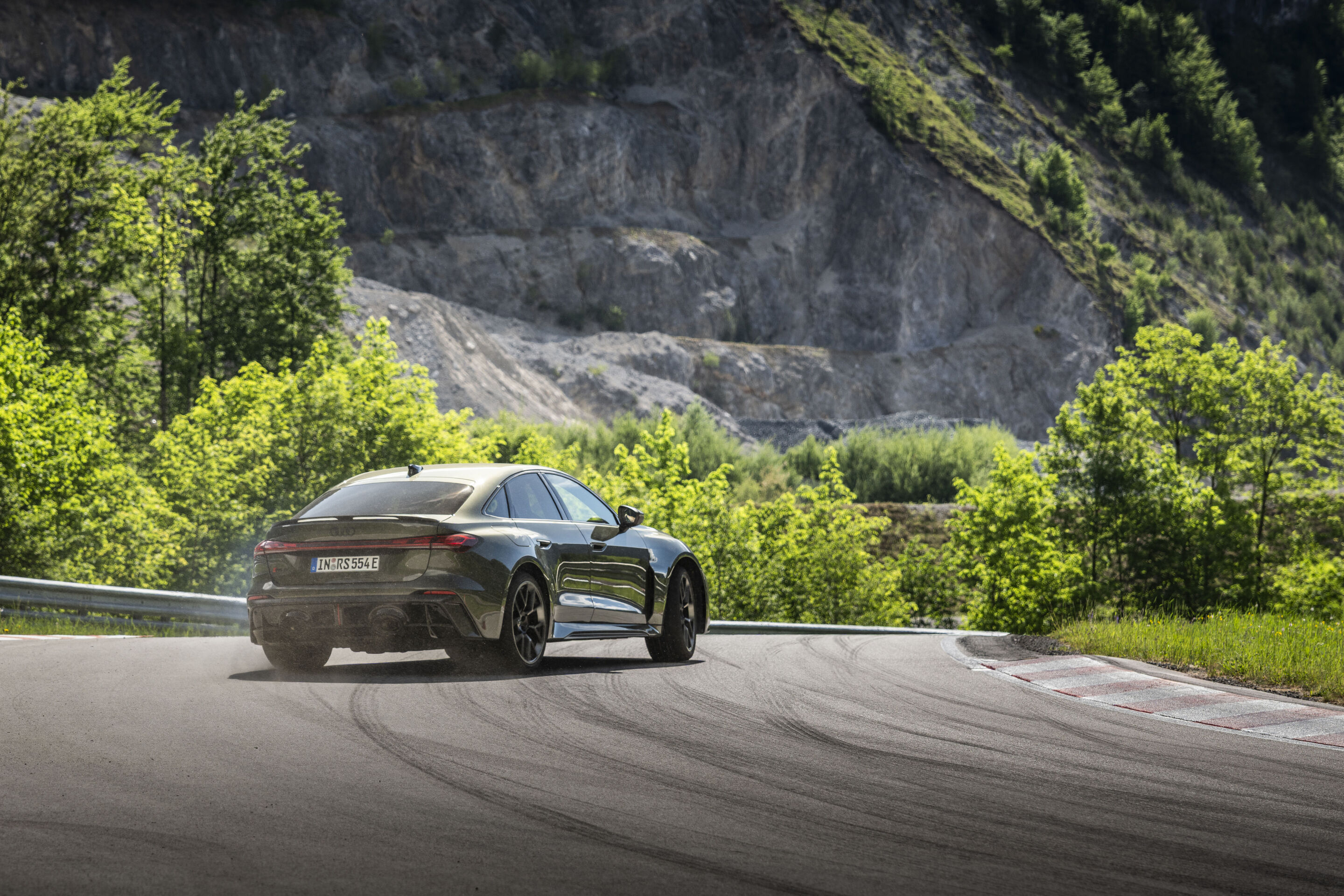 New Audi RS5 e-hybrid saloon rear view cornering