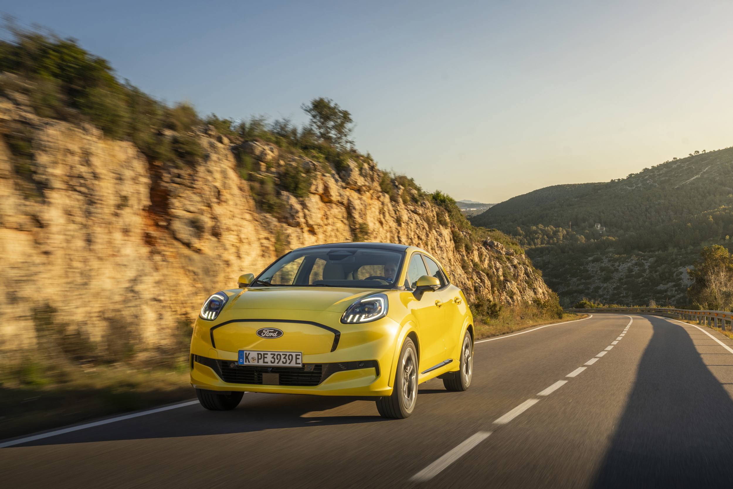 All-electric Ford Puma Gen-E in Electric Yellow on a country road