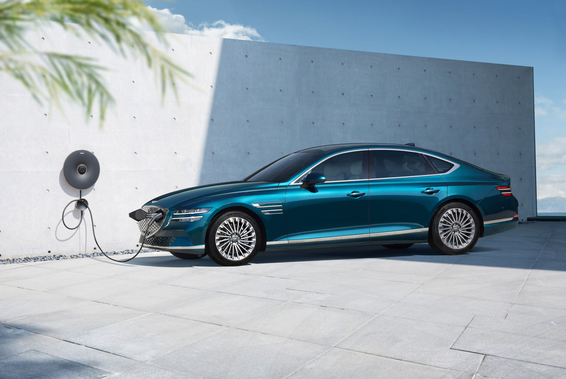 Genesis Electrified G80 charging at a home wallbox, the everyday case for salary sacrifice
