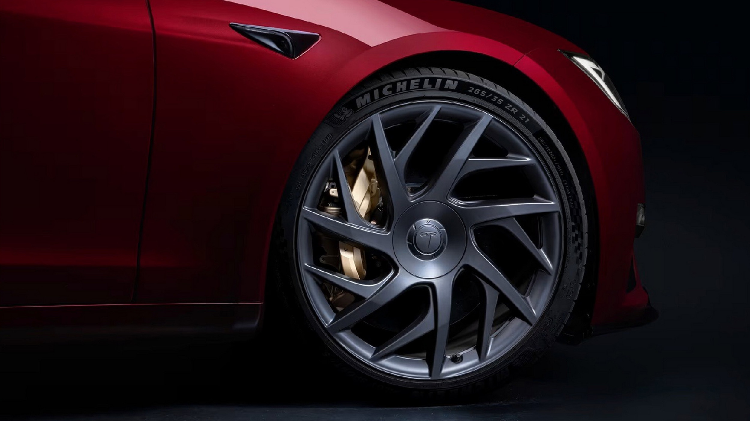 Tesla Model S 21-inch wheel and gold brake caliper, a salary sacrifice flagship detail
