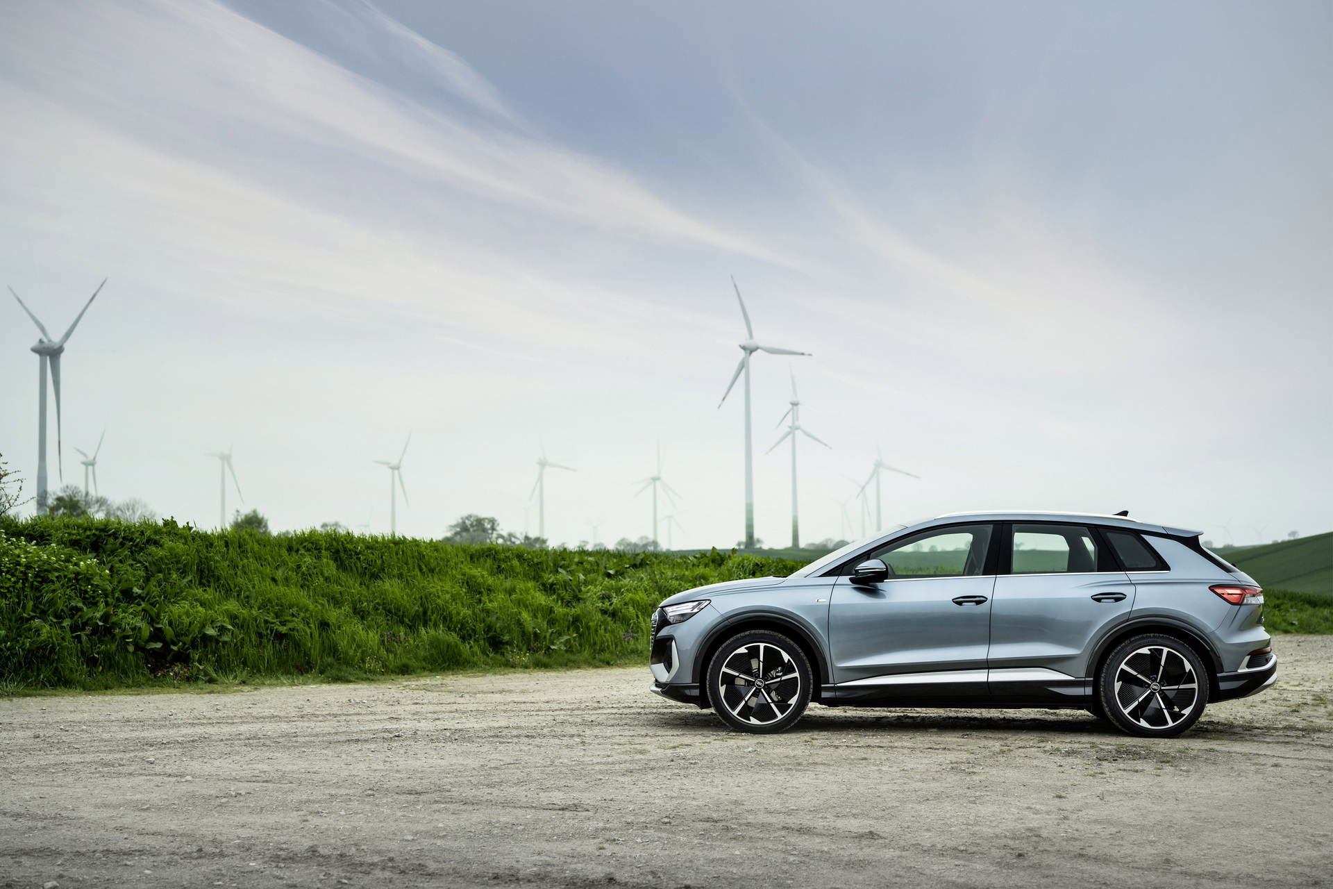 Audi Q4 e-tron used side profile with wind turbines