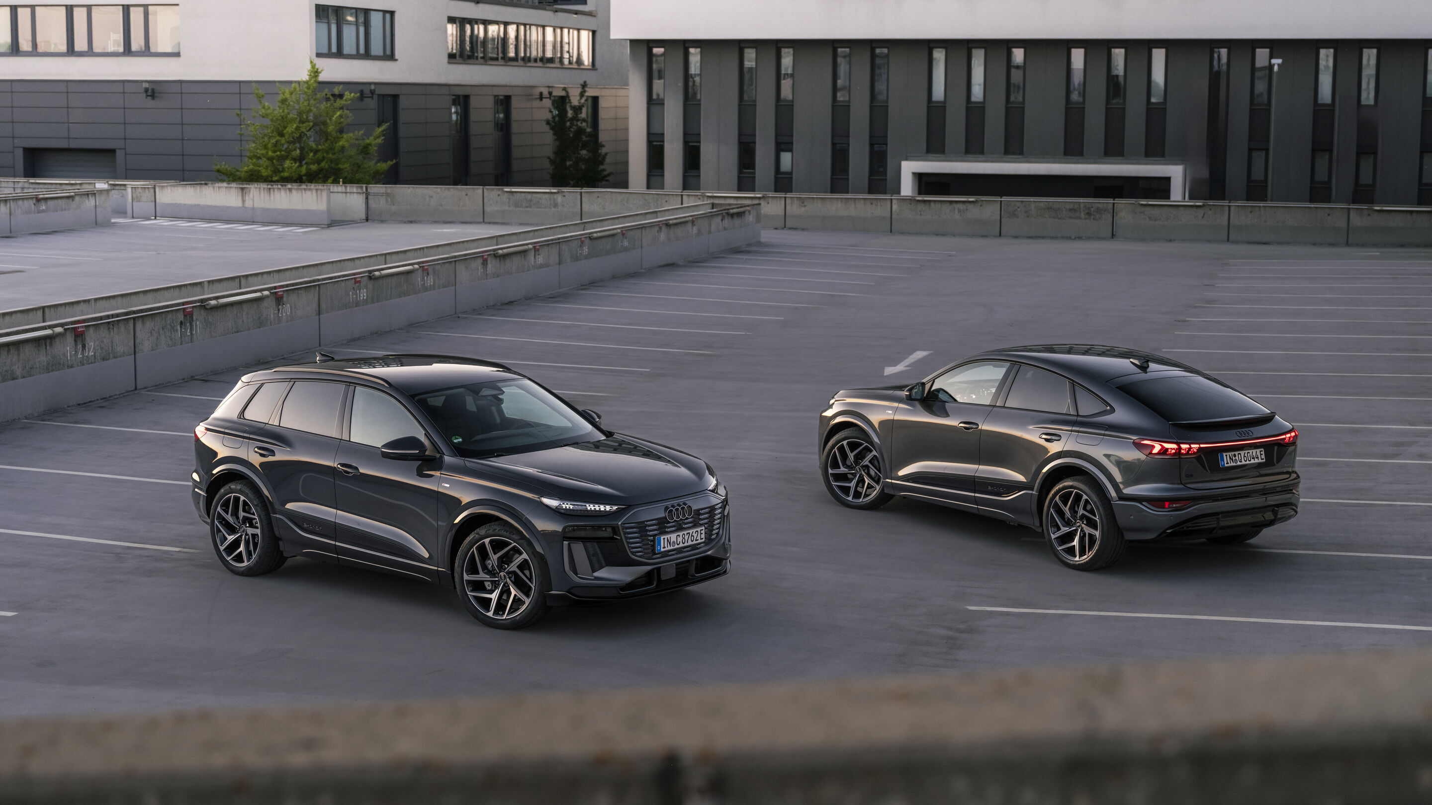 Two Audi Q6 e-tron EVs, where running costs vary sharply with charging choices