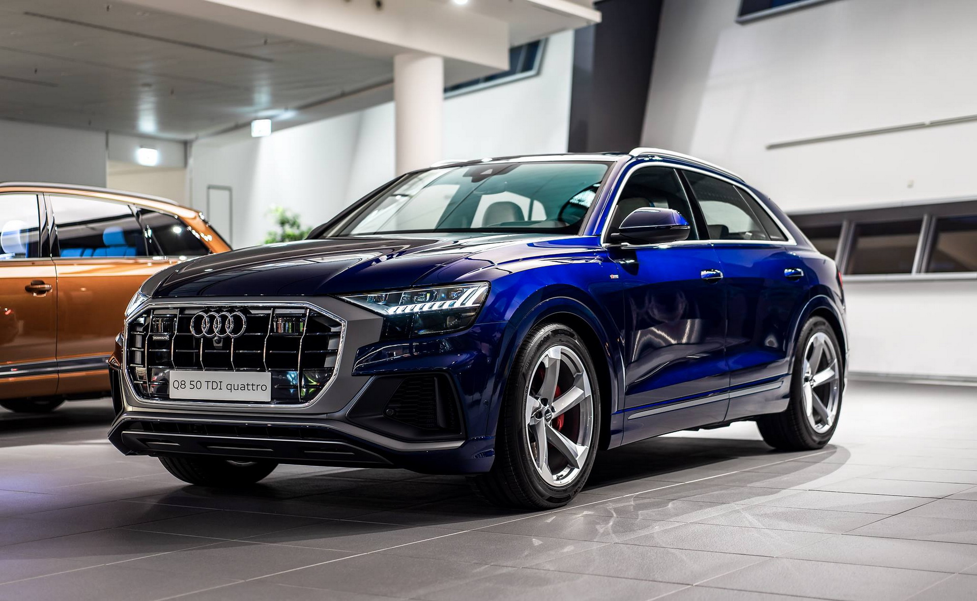 Audi showroom where a buyer weighs a car finance redress decision
