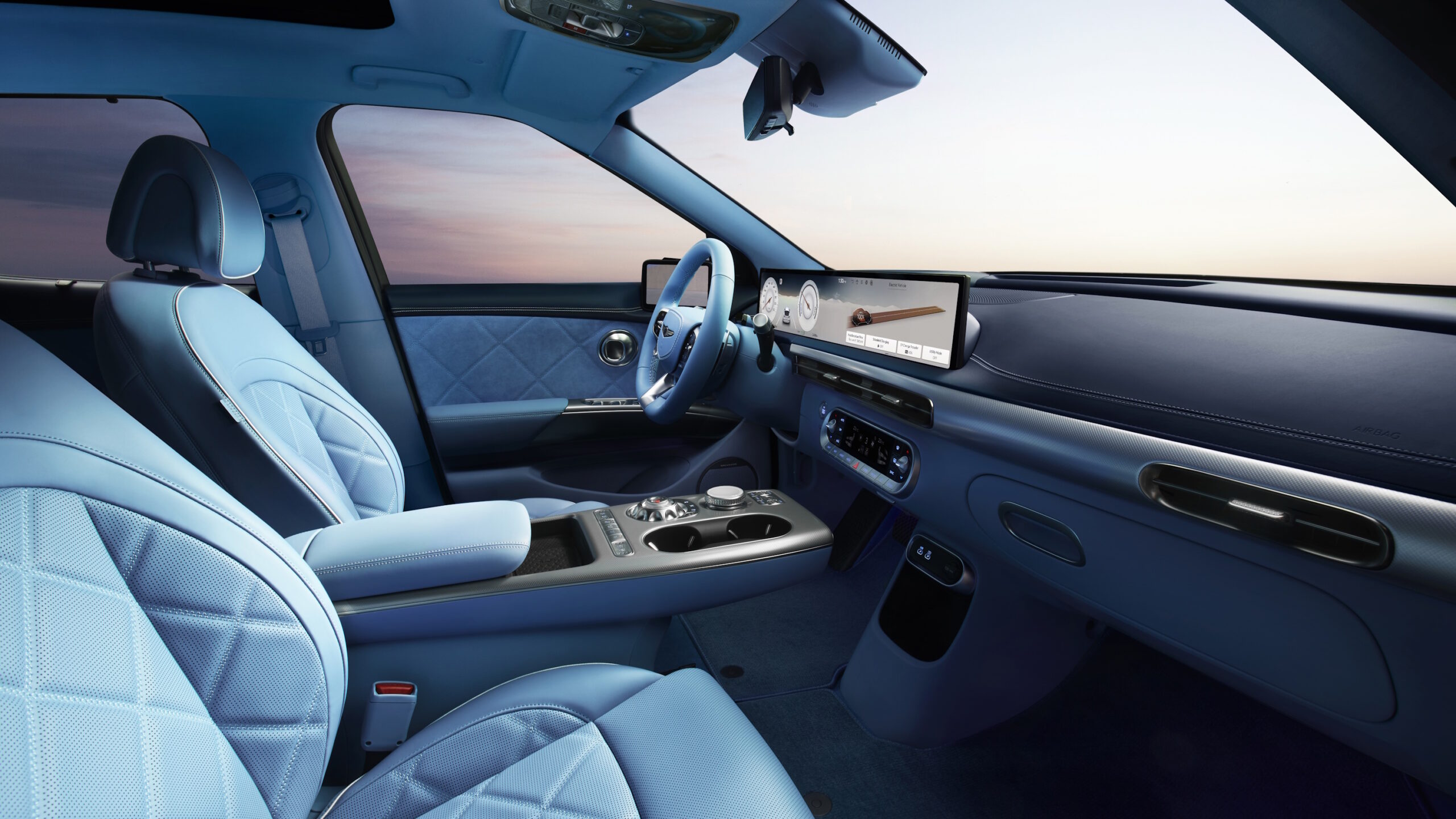 Genesis GV60 salary sacrifice blue leather interior and dashboard