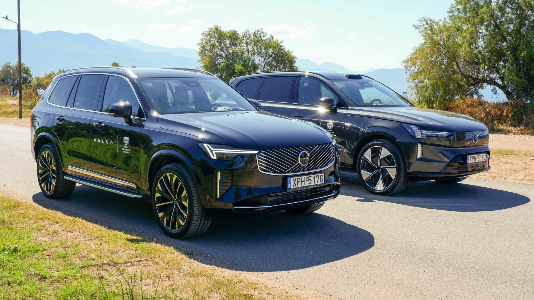 Volvo estate and SUV pairing on a forecourt, illustrating premium car finance early settlement decisions
