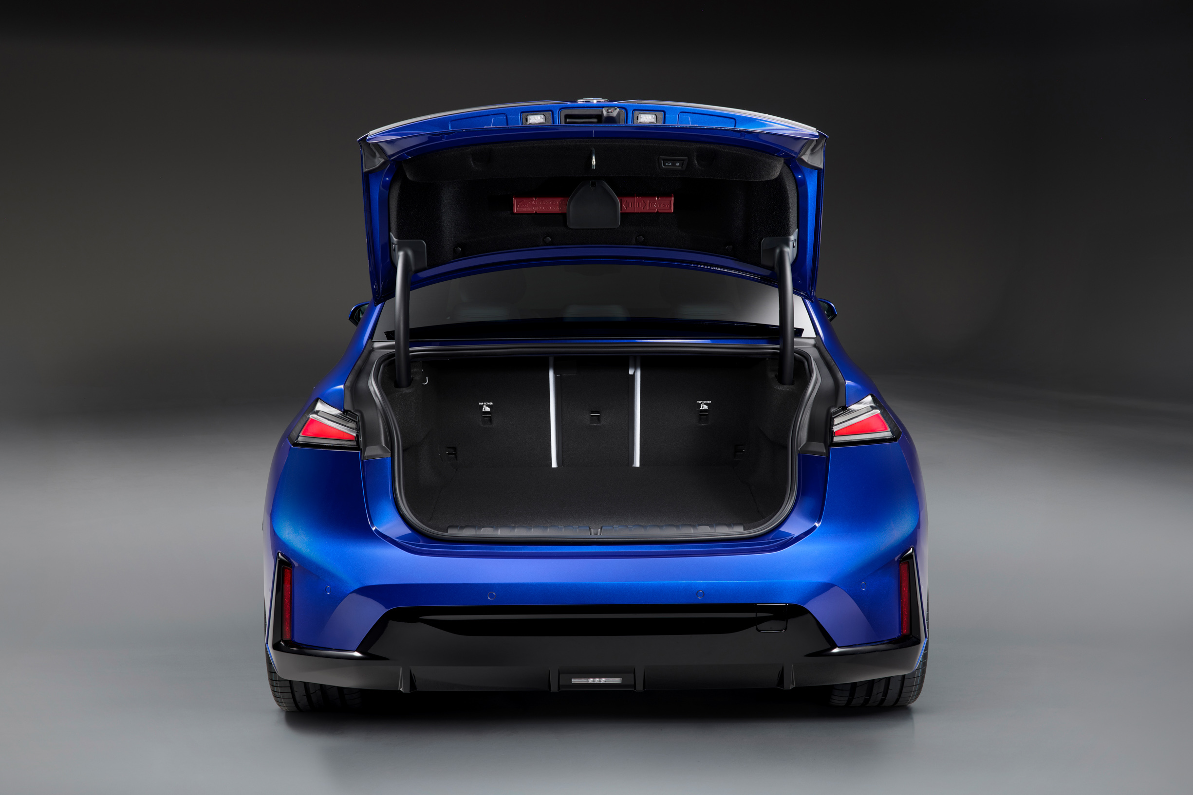BMW i3 electric 3 Series rear with boot open showing saloon luggage space