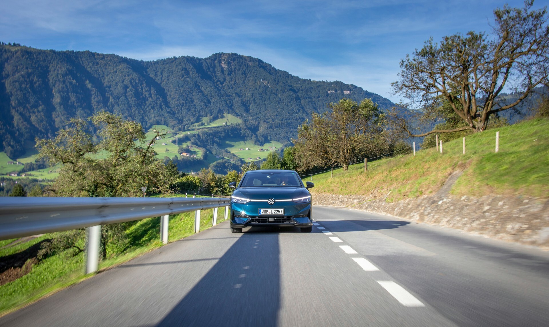 VW ID.7 salary sacrifice saloon driving on an open road, the executive EV in motion