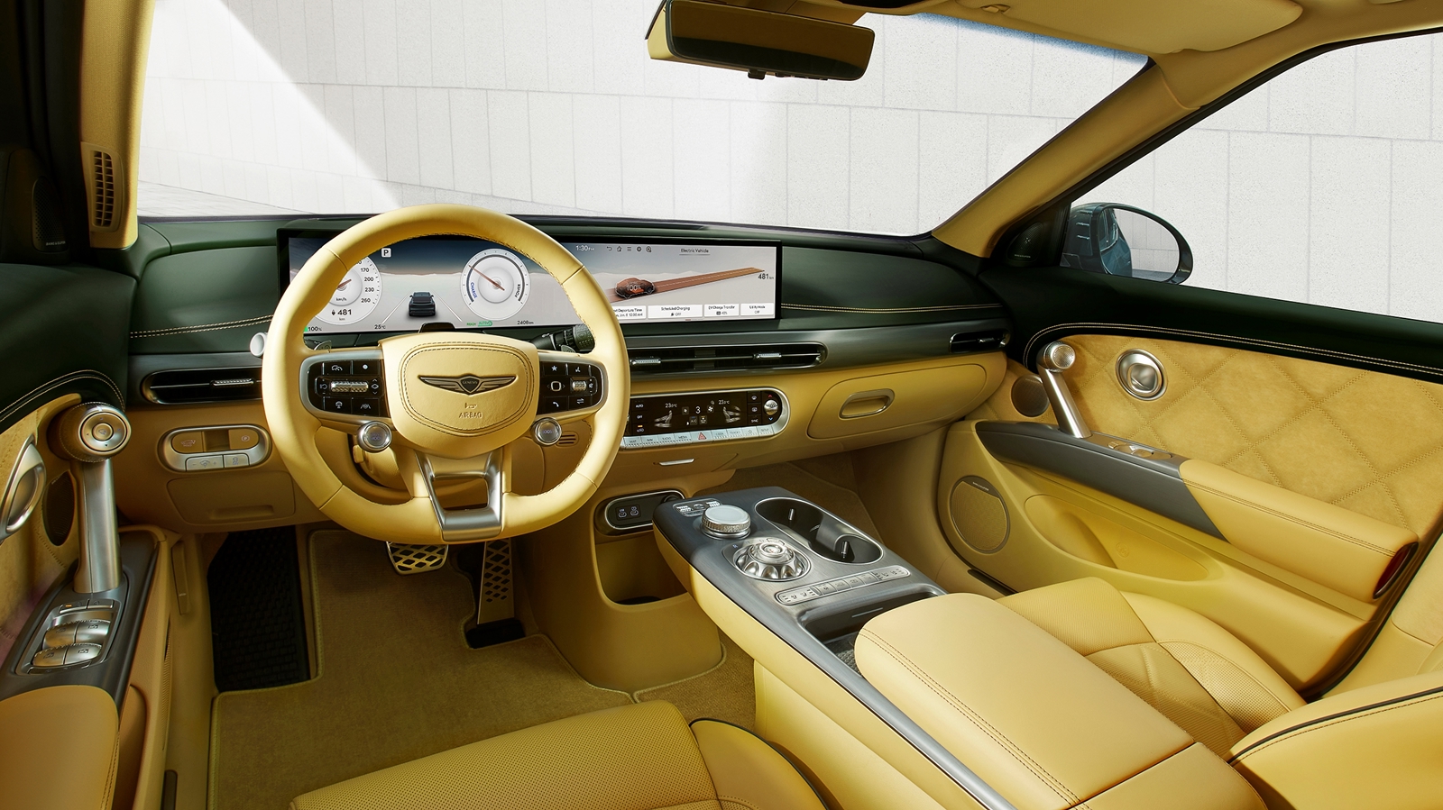 Genesis GV60 salary sacrifice cabin with widescreen display and Boost steering wheel