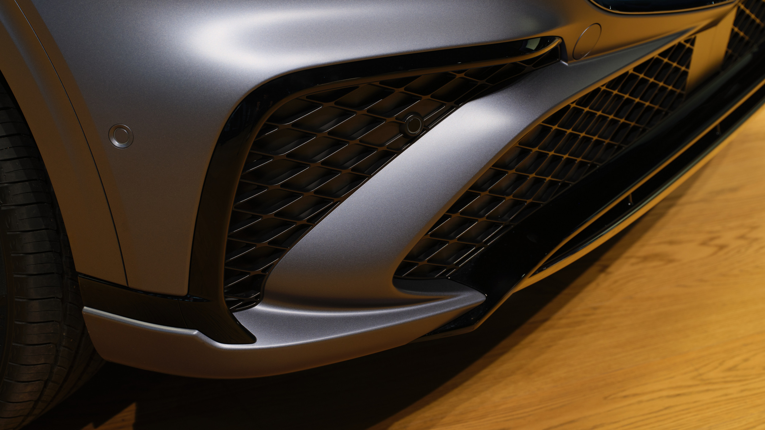 Genesis GV70 used front bumper and air-intake detail, an area to inspect for kerb damage