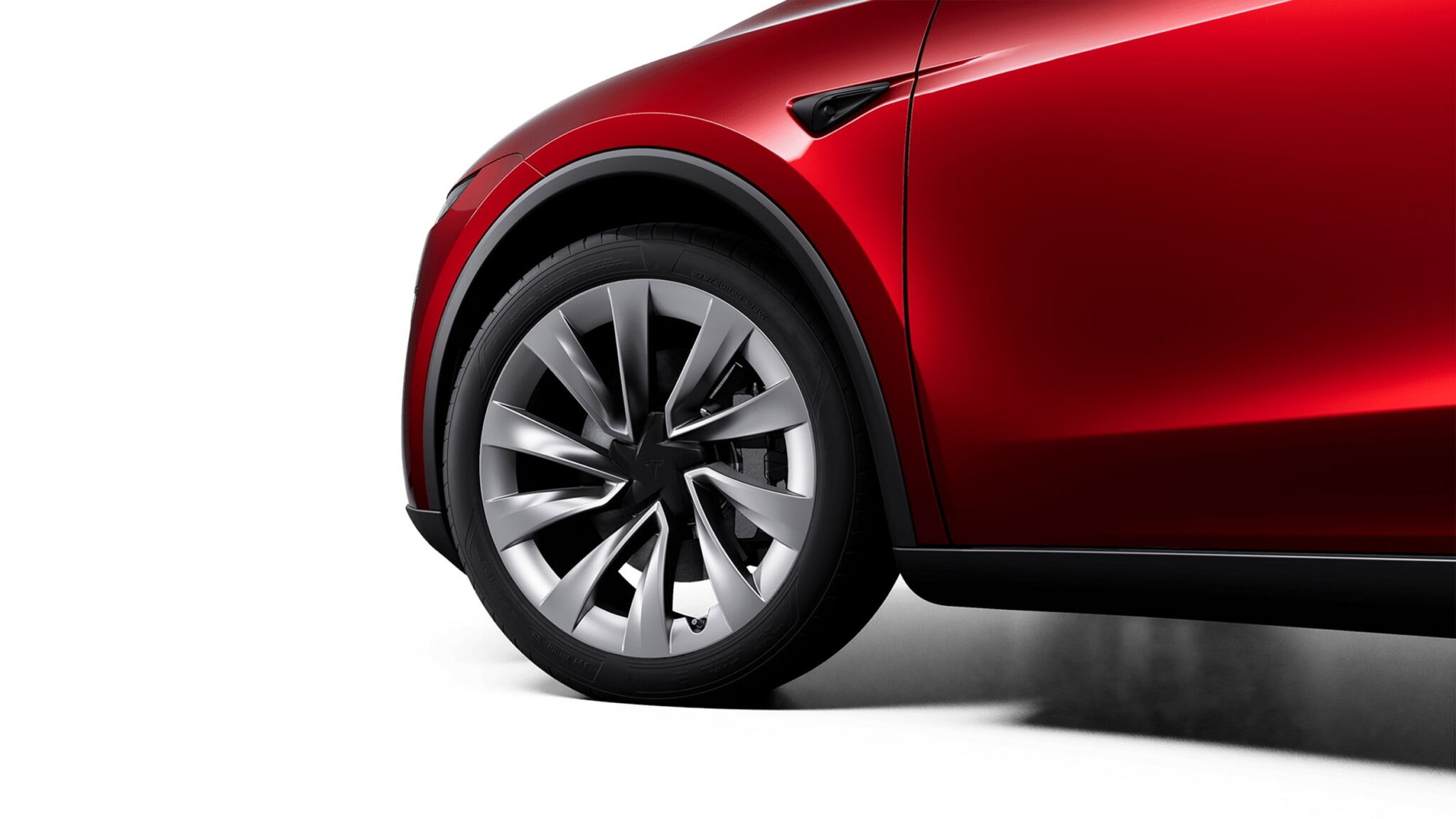 Tesla Model Y salary sacrifice 2026 rear view of the refreshed Juniper SUV on the road