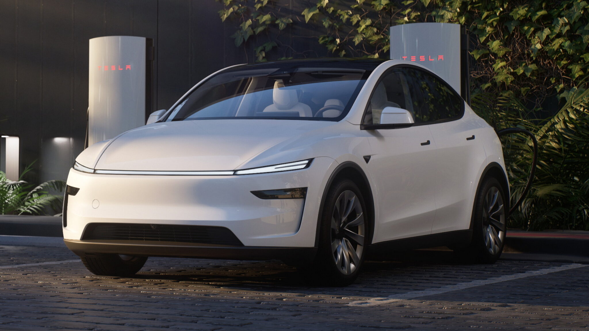 Tesla Model Y salary sacrifice candidate: Juniper Model Y rear three-quarter showing full-width light bar