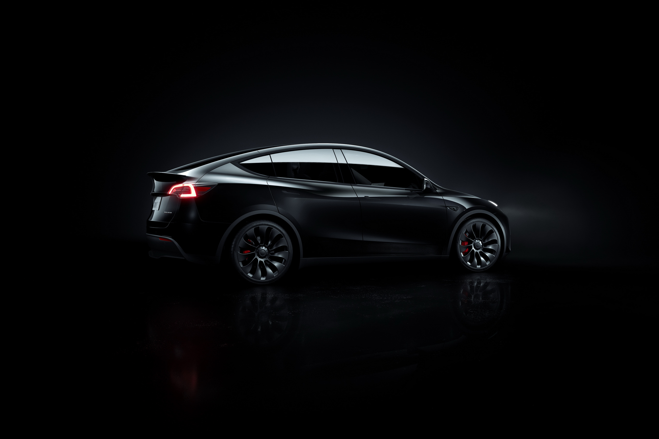 Used Tesla Model Y pre-Juniper studio side profile in black