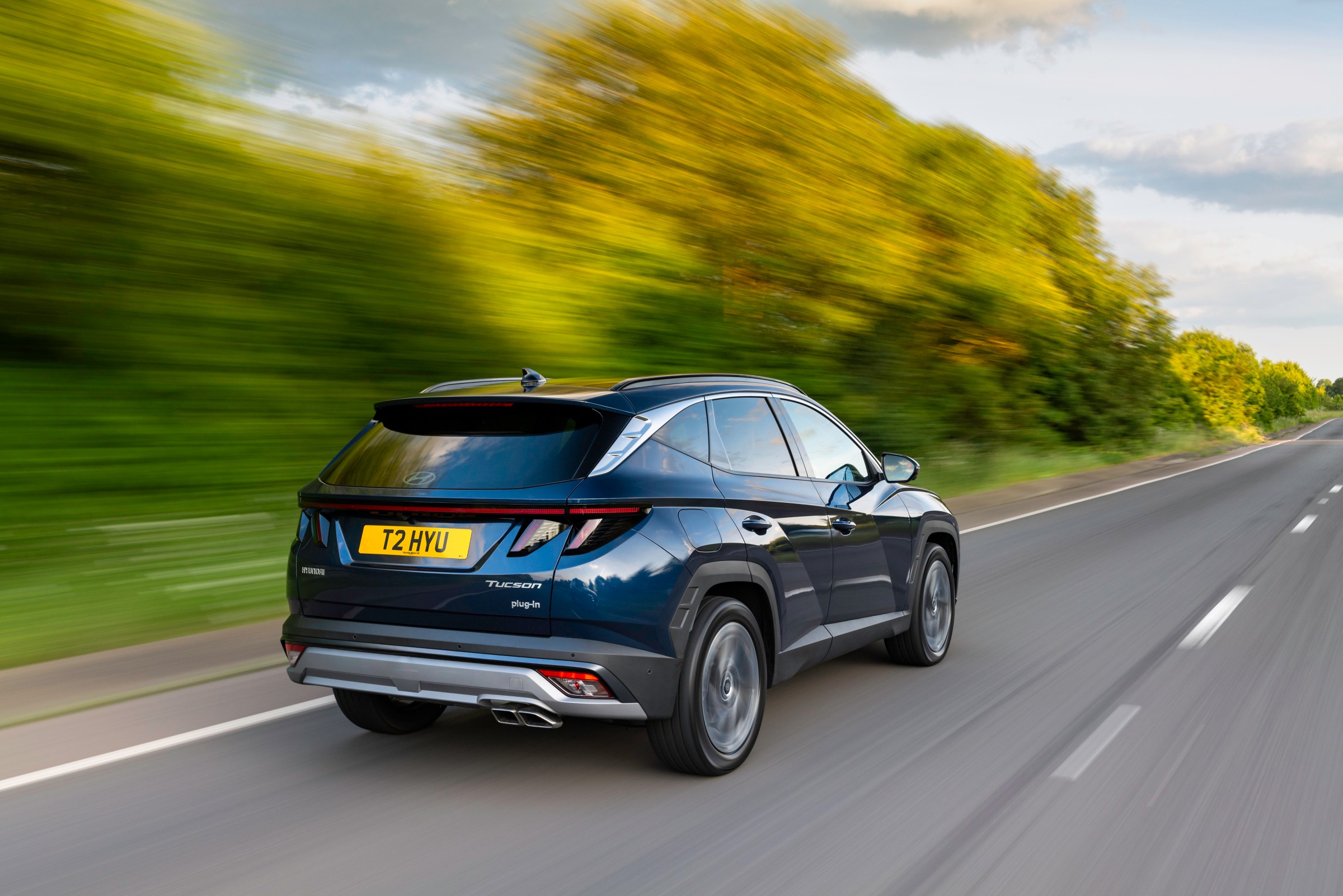 Hyundai Tucson plug-in hybrid Motability lease option on a country road