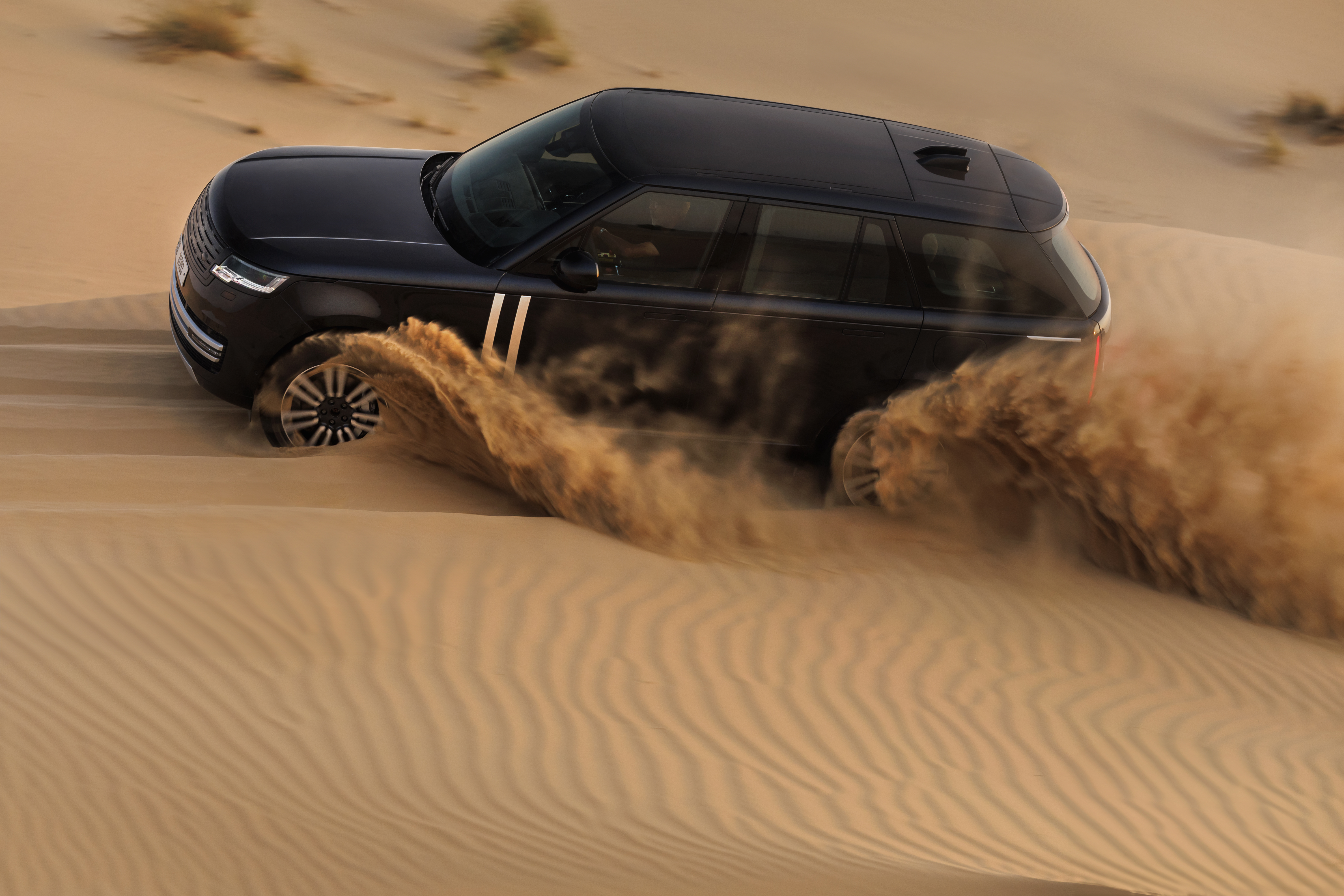 Range Rover Electric prototype front three-quarter, hot-weather testing