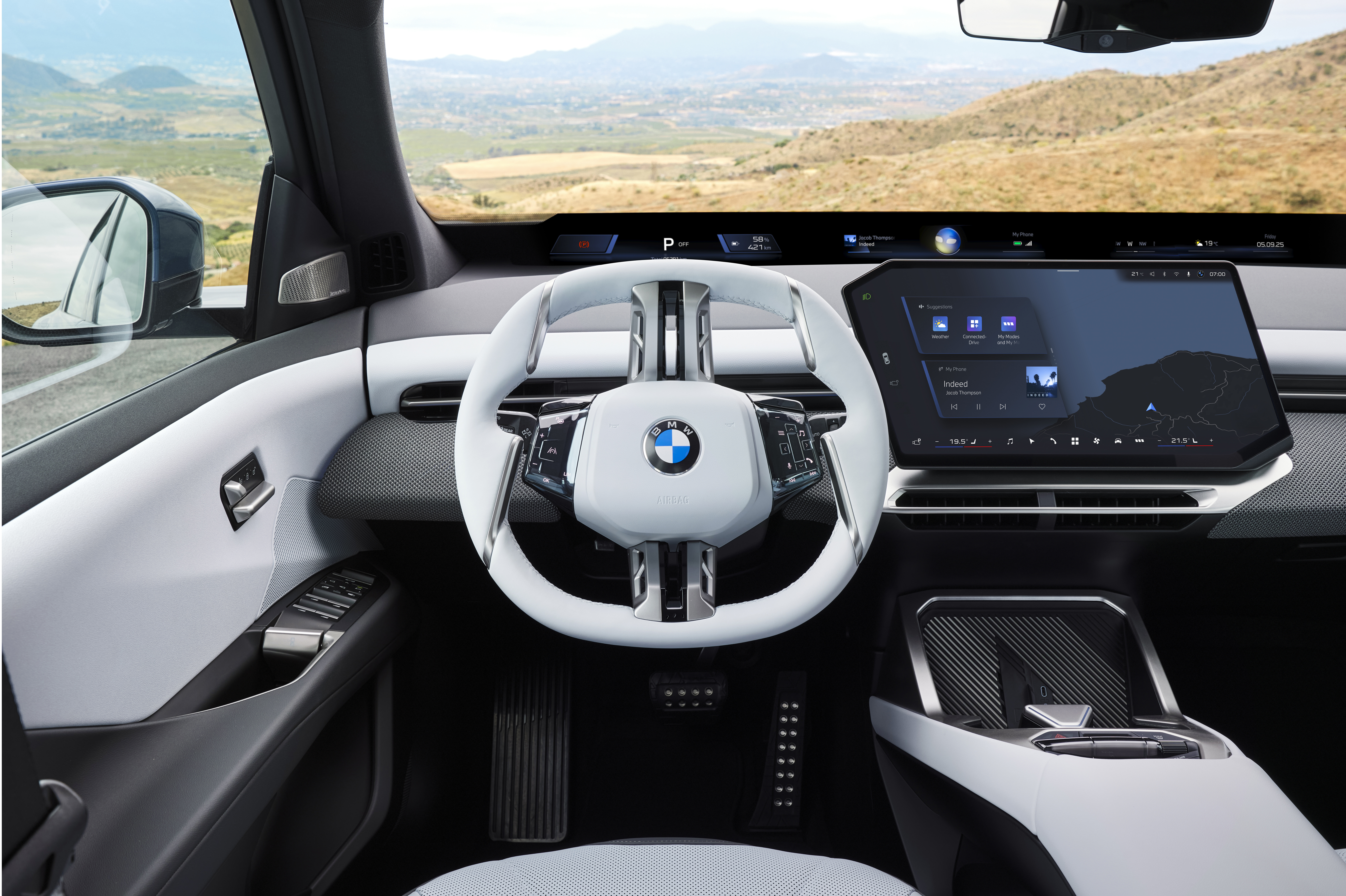 BMW iX3 interior with Panoramic iDrive display and new steering wheel