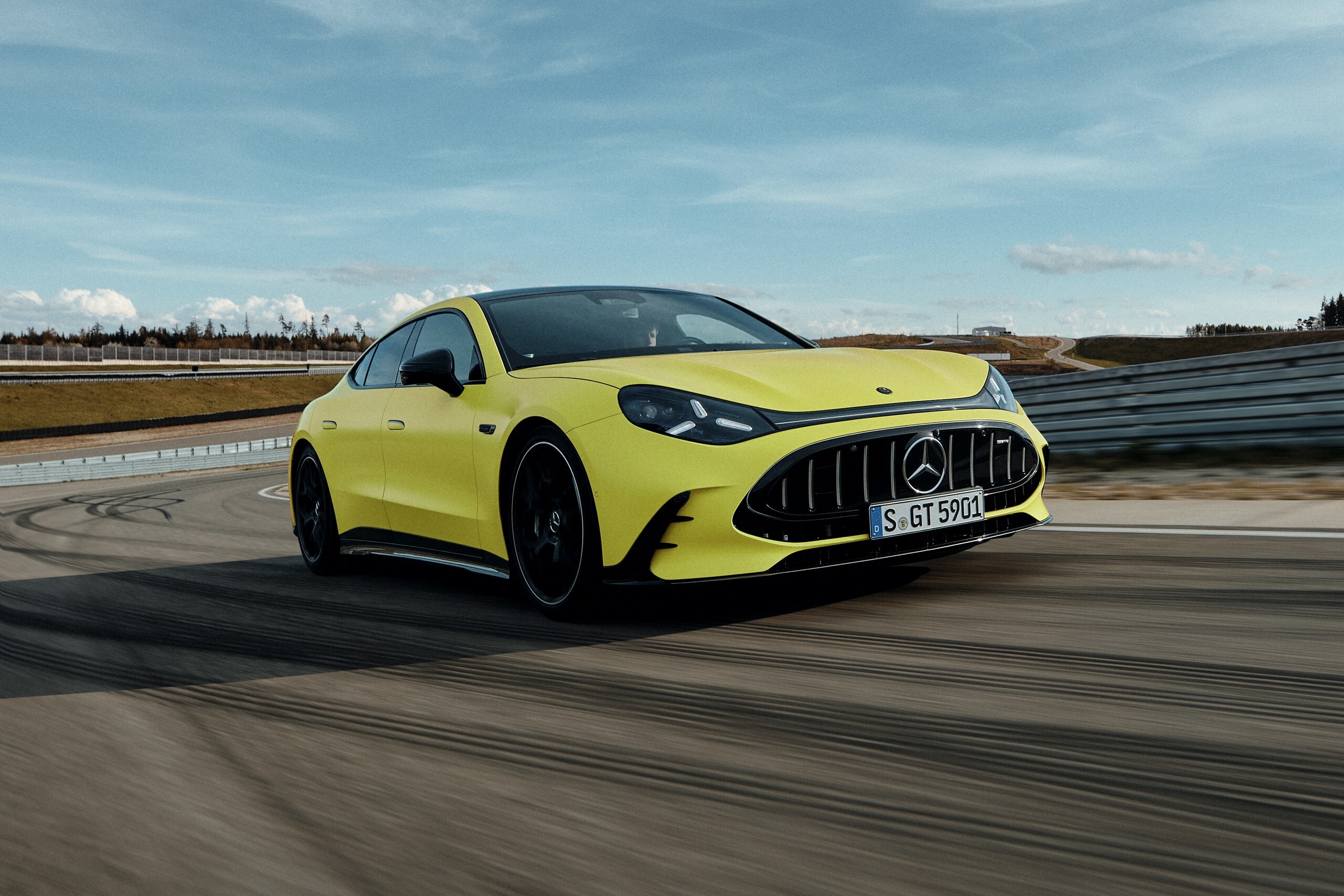 Mercedes-AMG saloon on a test track, illustrating the premium finance market where representative APR and personal APR diverge