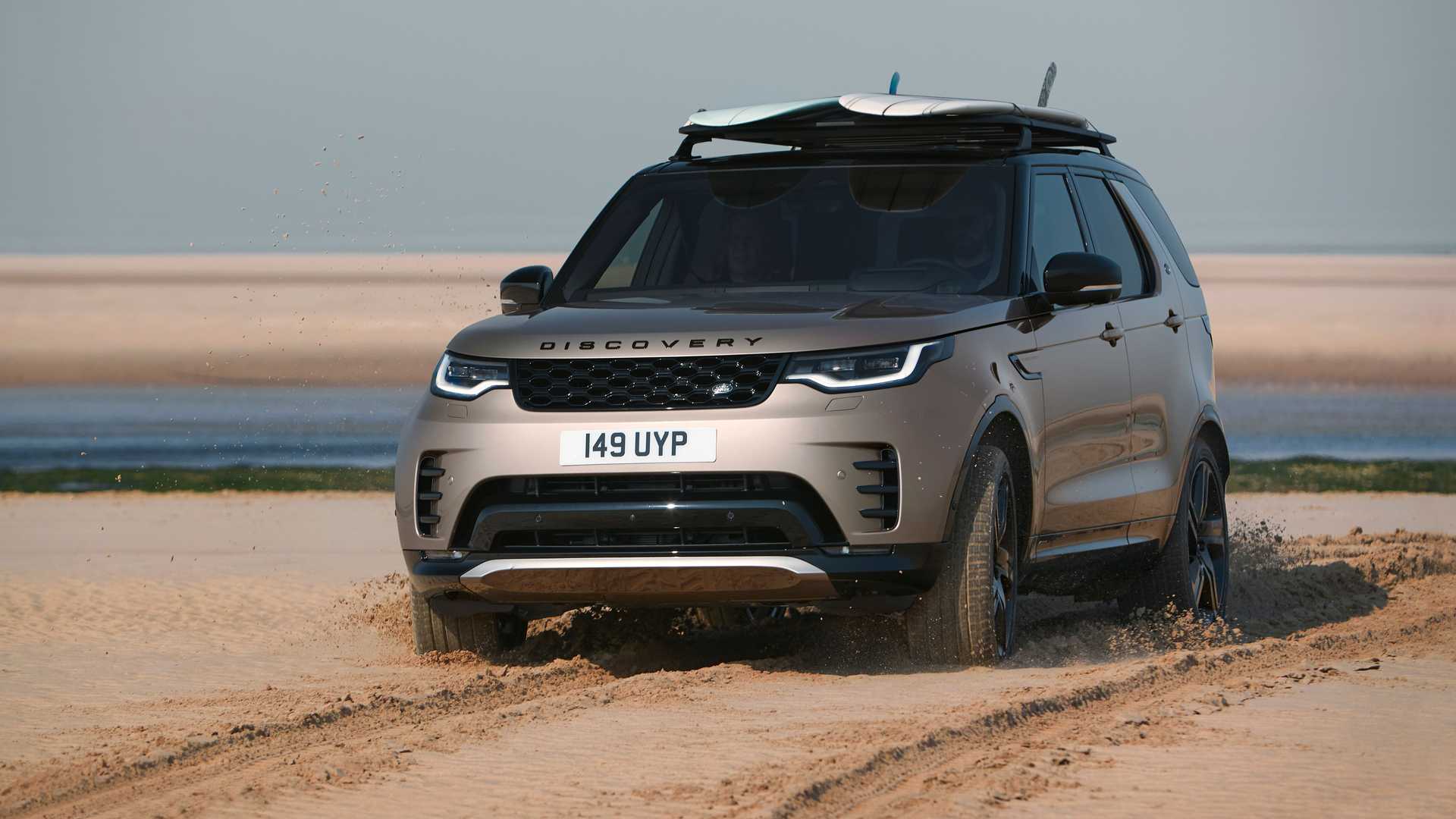 Land Rover Discovery 5 used buyer's guide exterior on gravel showing the L462 facelift front