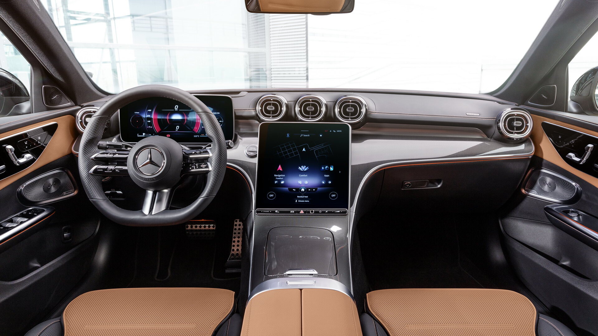Mercedes C-Class W206 interior with portrait MBUX touchscreen and tan upholstery