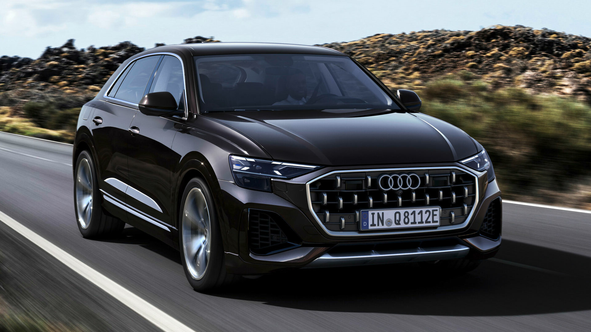 Audi Q8 SUV, the kind of premium metal a multi-car insurance policy covers in a UK household