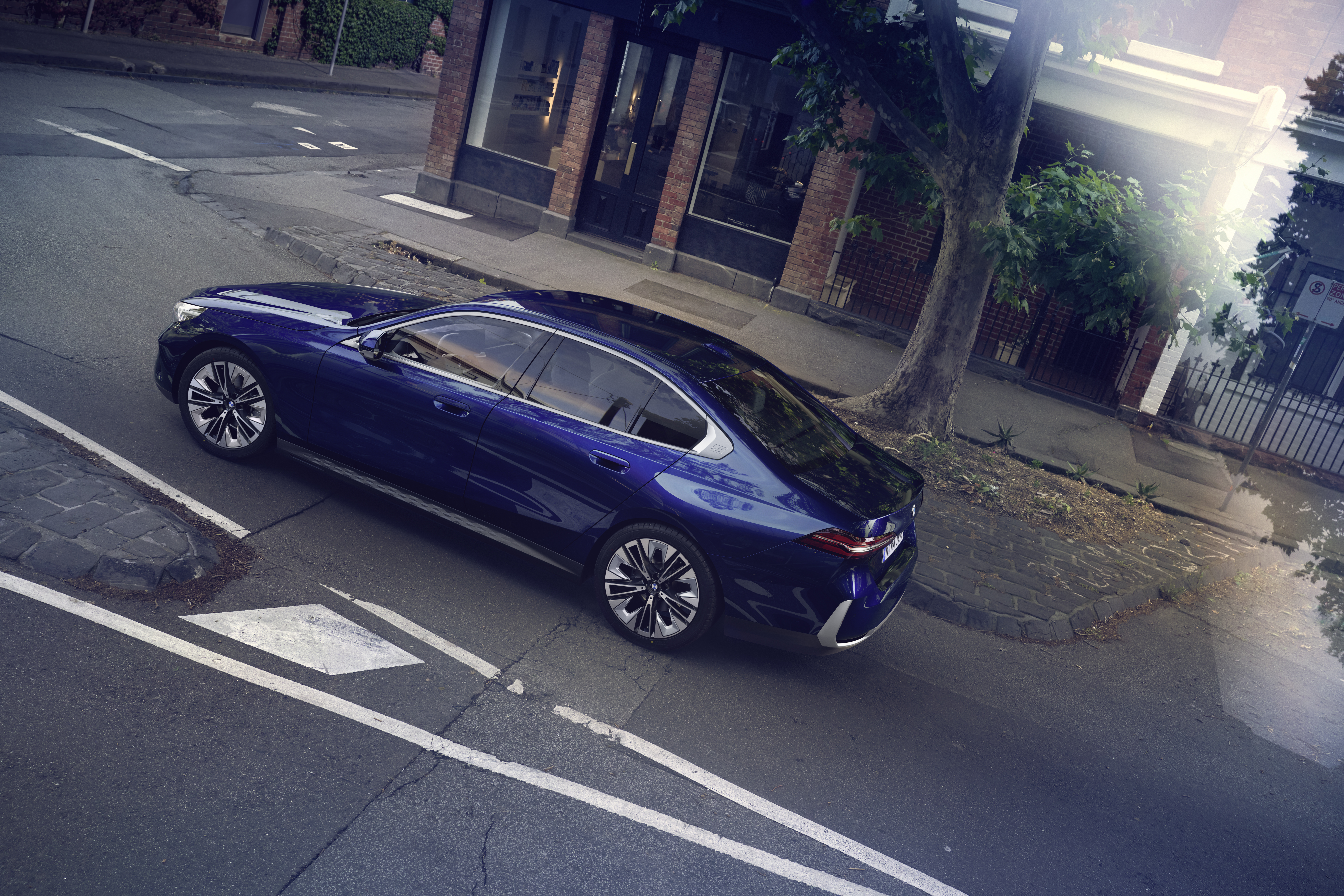 BMW 5 Series G60 Saloon overhead urban shot, Saloon vs Touring PCP pricing
